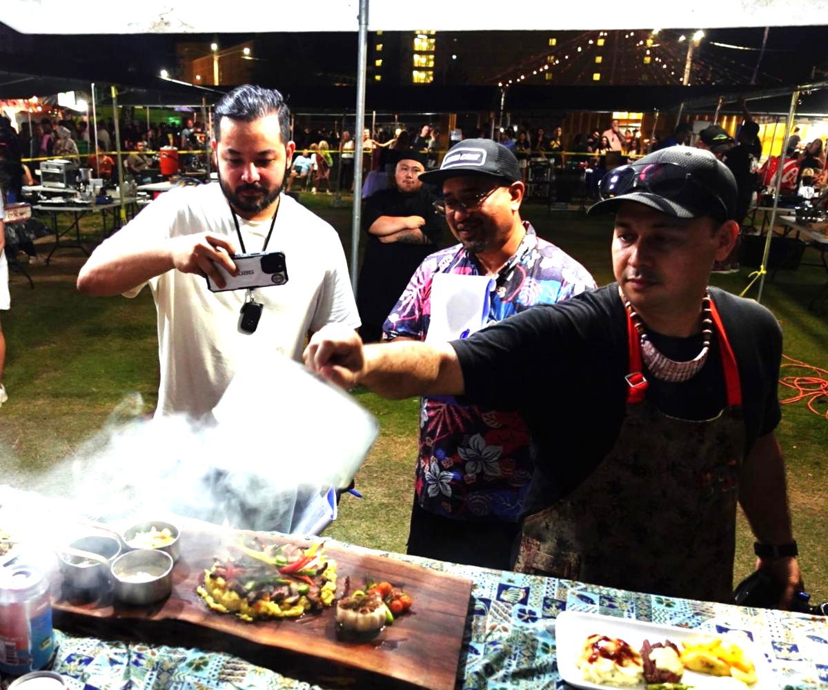 First place winner Chef Zenn Tomokane unveils his entry for the judges in the Marianas Chef Competition at the Taste of The Marianas International Food Festival in Garapan, Saipan in May 2024. The 26th Annual Taste of The Marianas will be held every Saturday evening in May 2025.