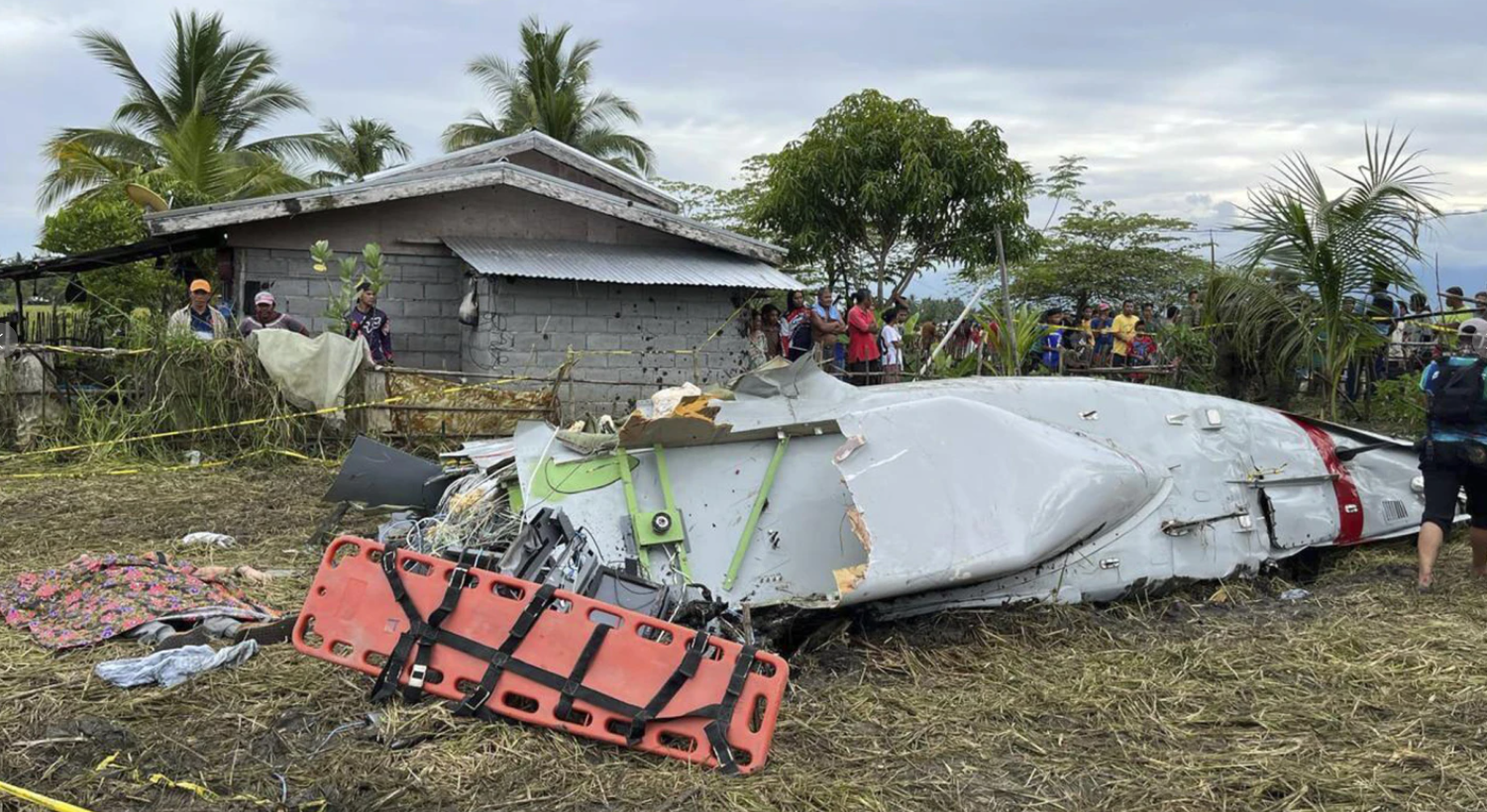Wreckage of an aircraft in a rice field in Maguindanao del Sur province, in the southern Philippines. Officials say a U.S. military-contracted plane has crashed in the rice field, killing all people on board on Thursday, Feb. 6, 2025.