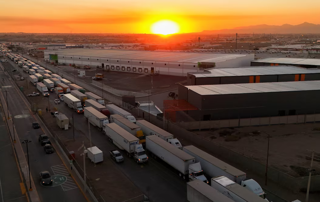 A drone view shows trucks waiting in line near the Zaragoza-Ysleta border crossing bridge to cross into the U.S., in Ciudad Juarez, Mexico, Jan. 31, 2025.