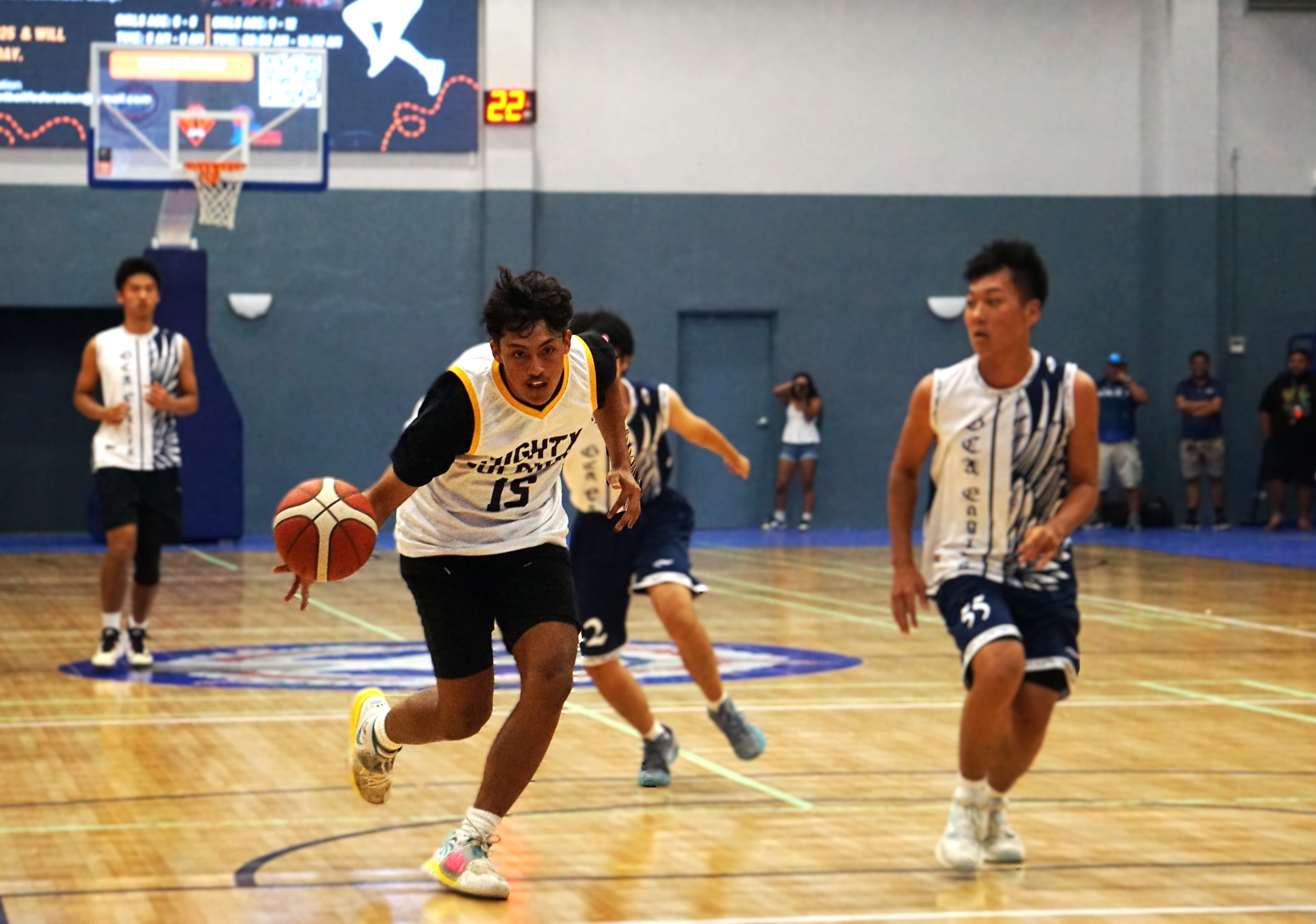 MHS V's Joseph Pangelinan beats two defenders in a fastbreak attempt against GCA in a boys high school division game of the PSS-NMIBF Interscholastic Basketball League SY24-25 at the Ada gym on Wednesday.