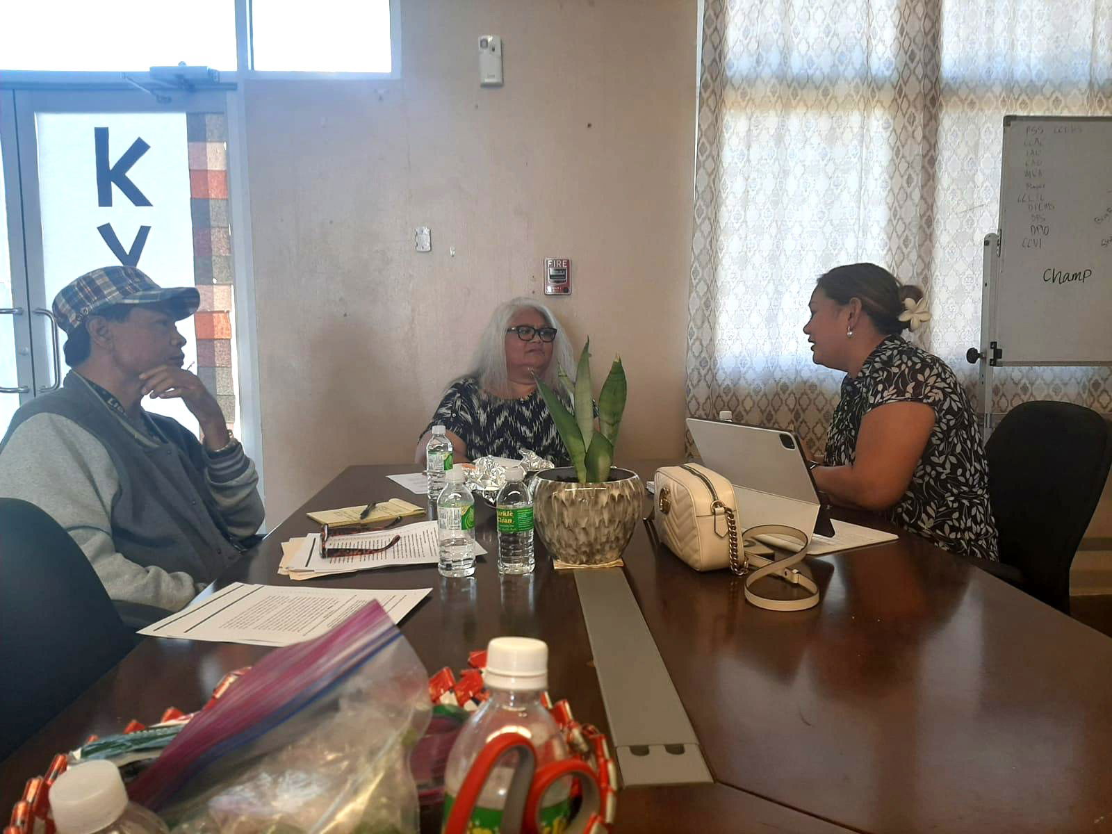 Sen. Corina Magofna, right, speaks during a meeting with Indigenous Affairs Office Resident Executive Luella Marciano and indigenous advocate, former Rep. Crispin Ogo, at the IAO office in Koblerville on Tuesday.Contributed photo