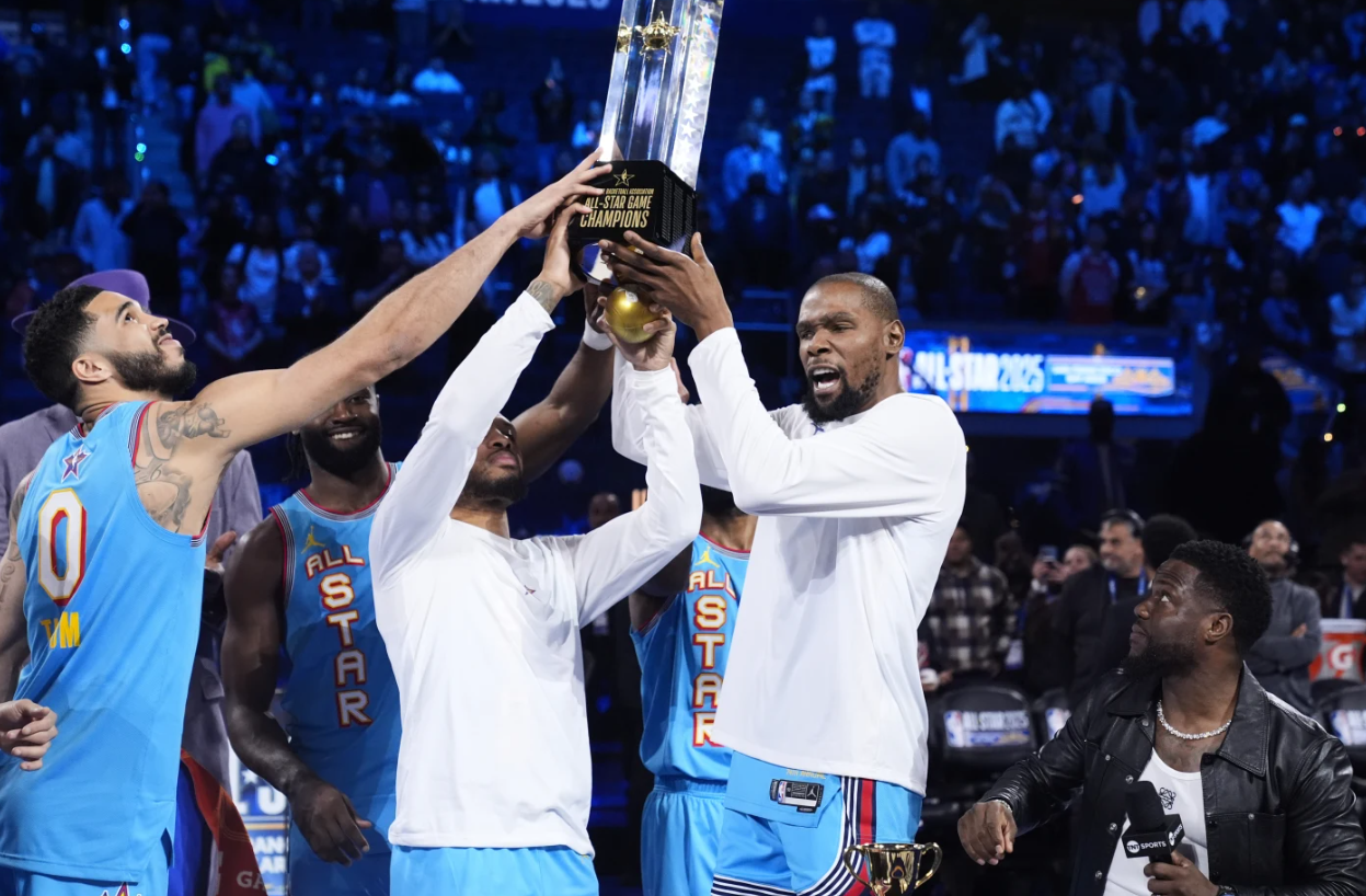 Members of Shaq’s OGs hold the winners’ trophy after the NBA All-Star game Sunday, Feb. 16, 2025 in San Francisco.