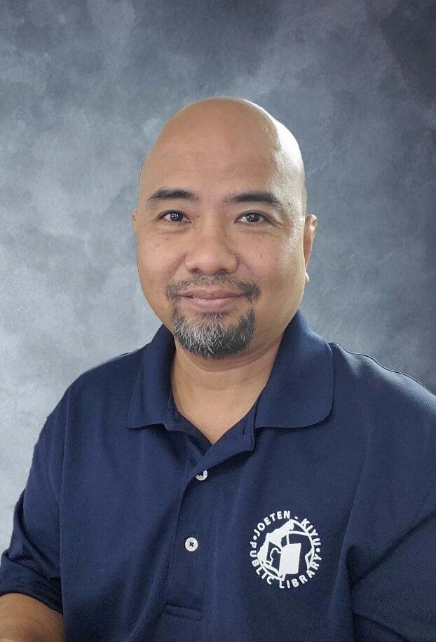 Systems Librarian Omar T. Manacop 