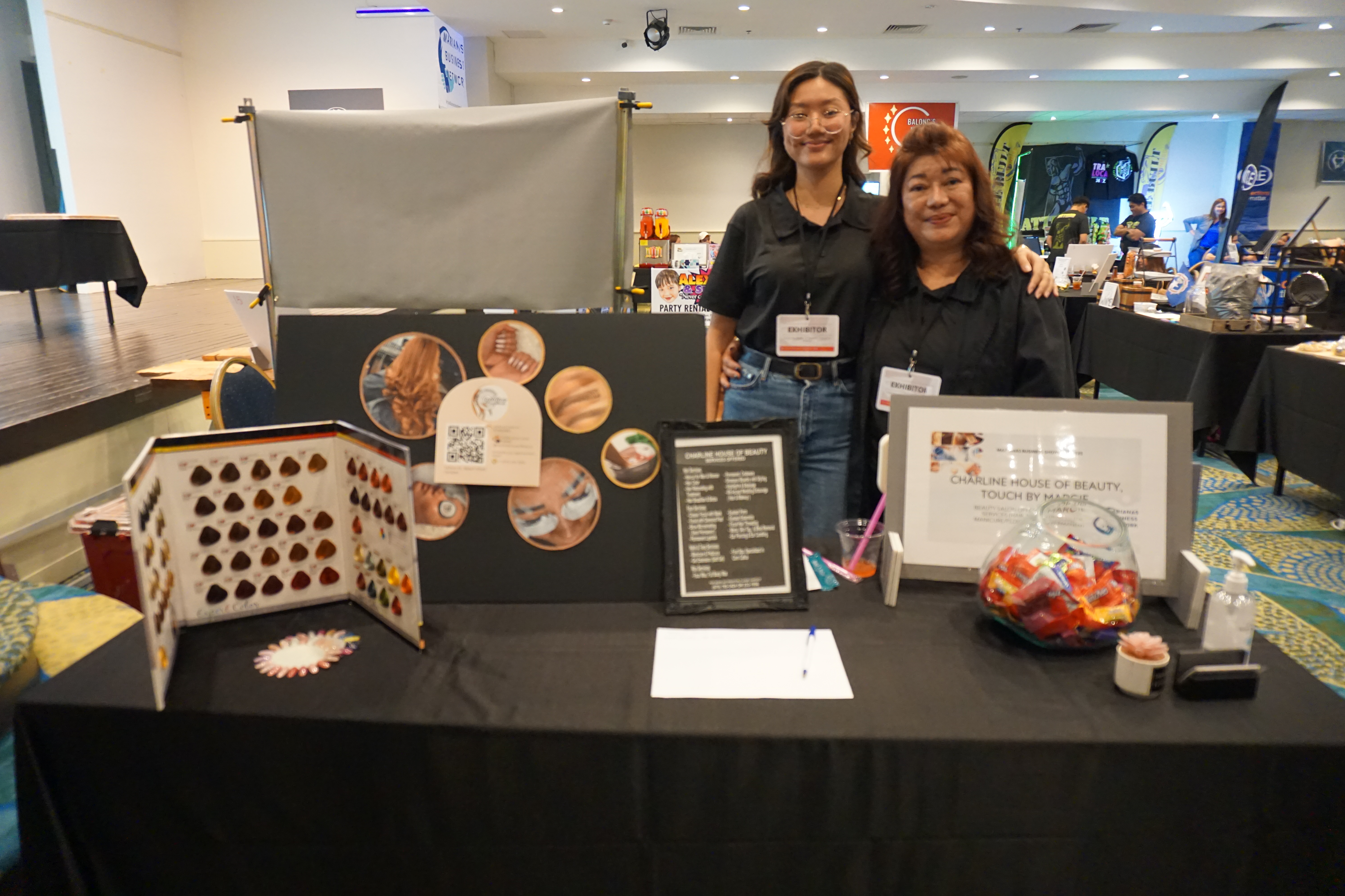 Charline Ebreo, left, and her mother, Mageline Borja, at the Marianas Business Showcase. 