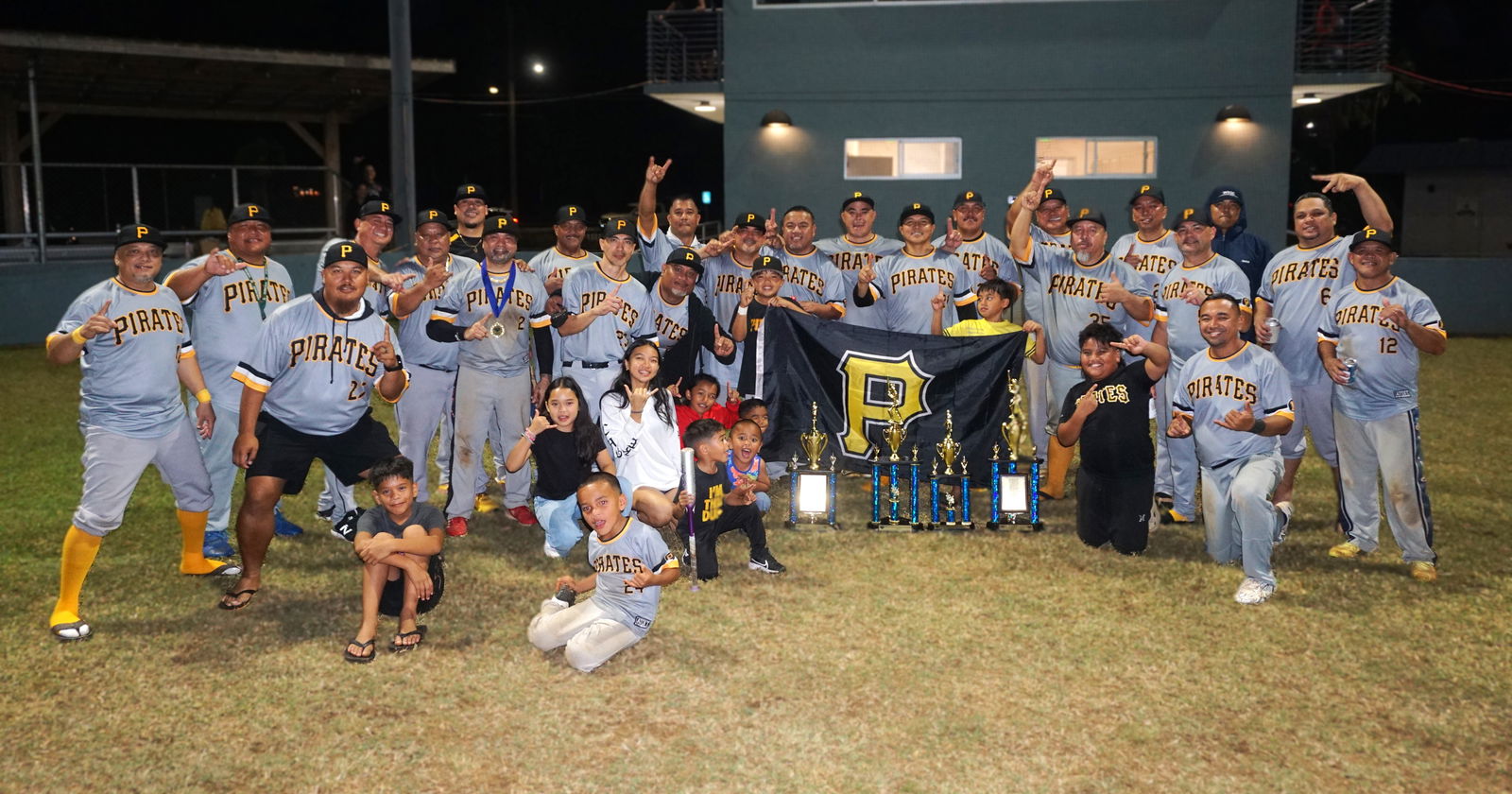 The Pirates pose for a group photo as the back-to-back SBL Masters League champions at the Francisco "Tan Ko" Palacios Baseball Field on Wednesday night.Photo by James F. Sablan Jr.