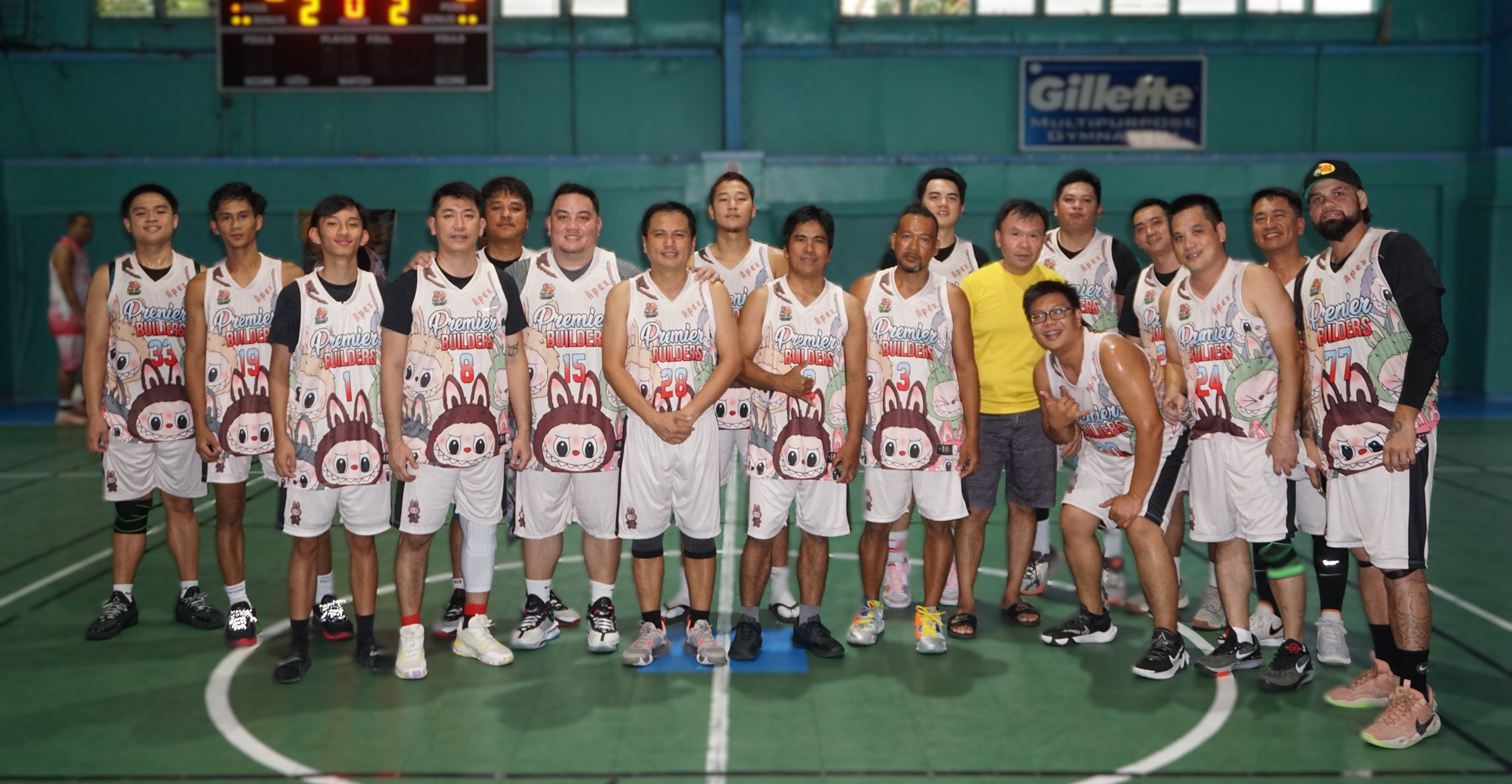 Premier Builders pose for a photo after earning their first win in the Alpha Kappa Rho 1st Semi-Open Invitational Basketball League 2025 at the TSL Sports Complex on Sunday.