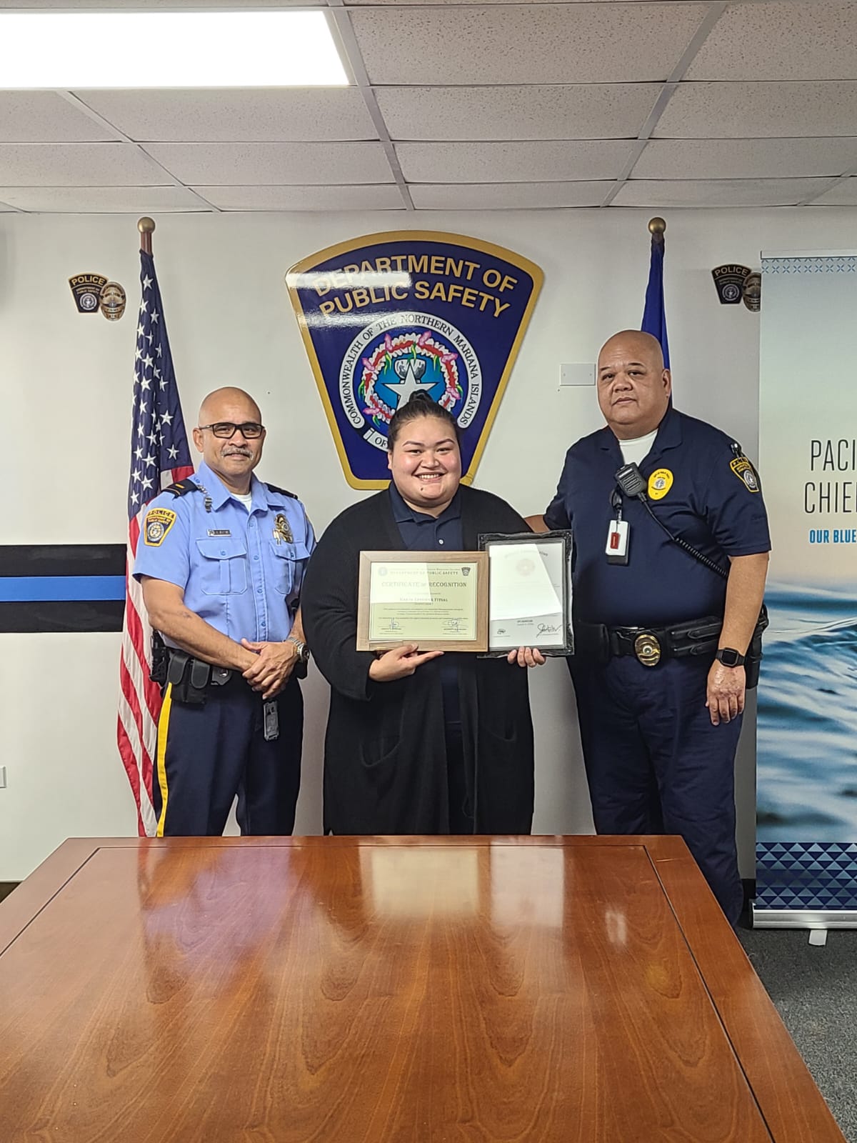 DFEMS dispatcher Karay Fitial, center.