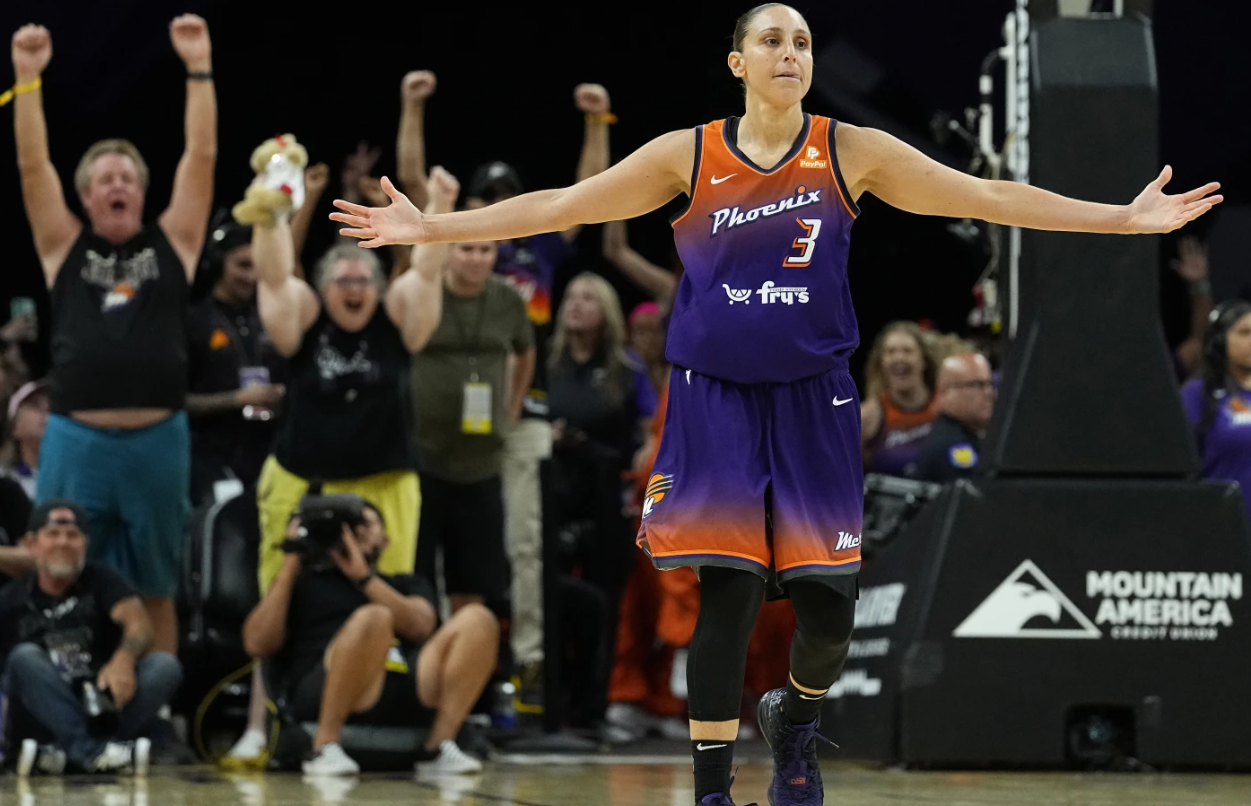 Phoenix Mercury’s Diana Taurasi celebrates after making her 10,000th career point during the second half of a WNBA game against the Atlanta Dream on Aug. 3, 2023 in Phoenix.AP