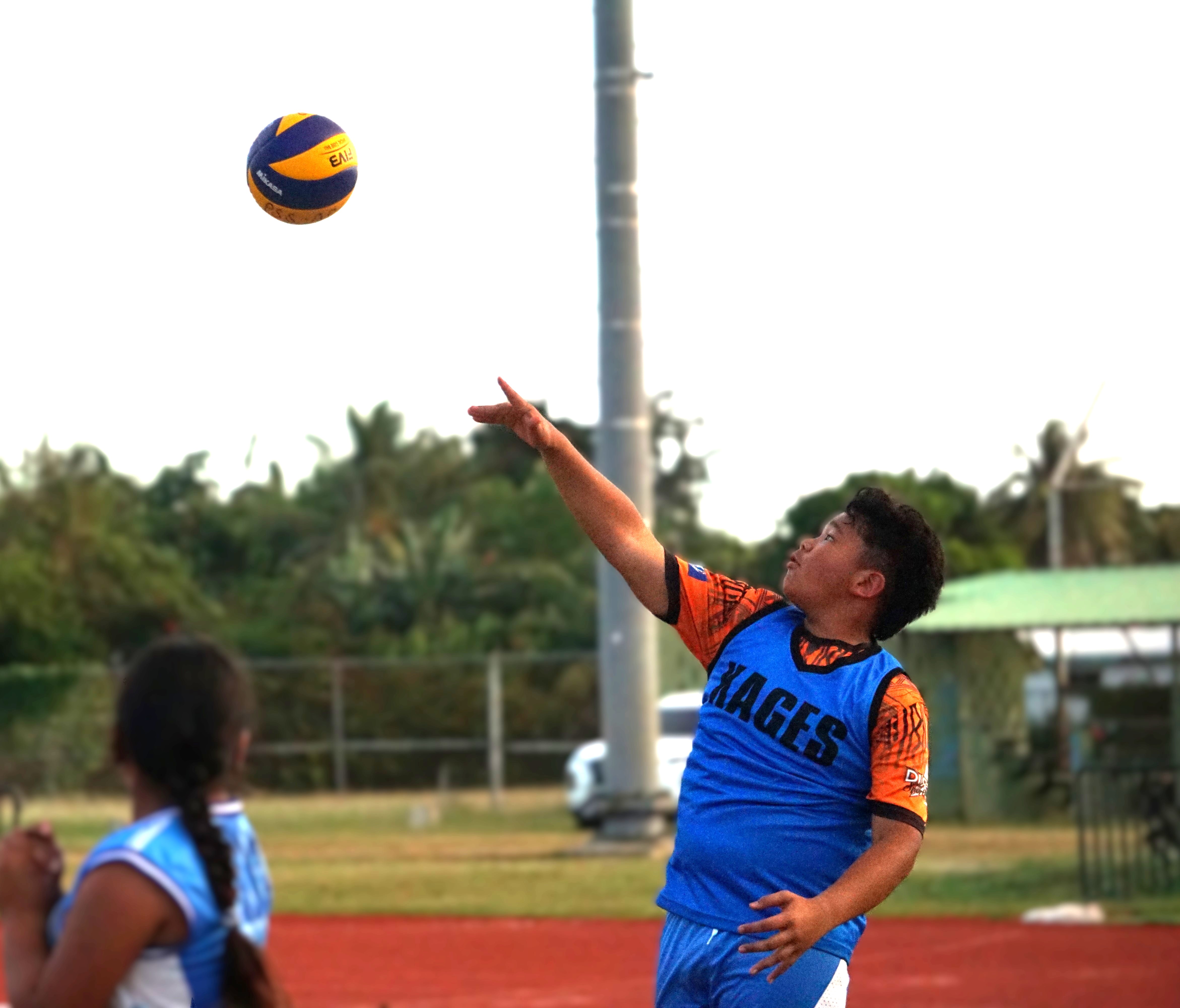 A Kagman Elementary School student connects the overhand serve during a co-ed elementary school division game of the PSS-NMIVA Interscholastic Volleyball League SY24-25 at the Oleai Sports Complex on Friday.
