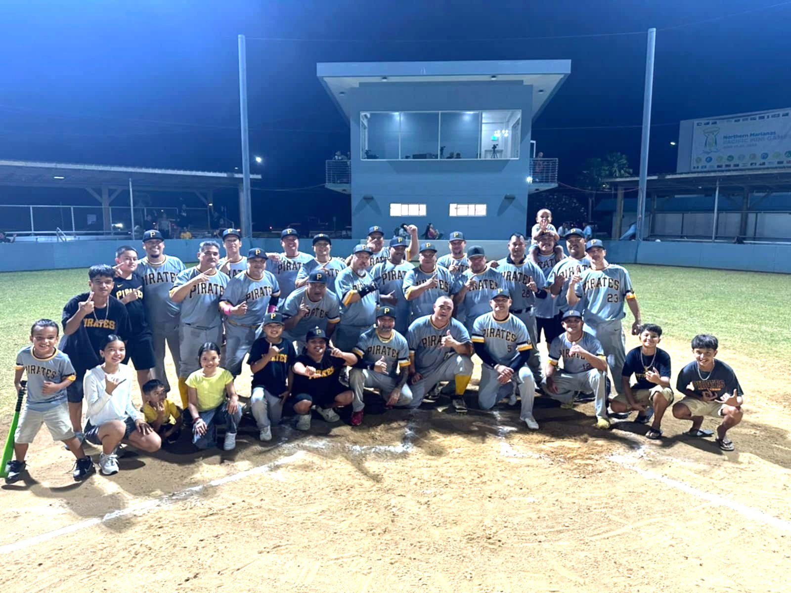 The Pirates pose for a group photo after securing the pennant following Monday’s game against the Falcons in the 2024 SBL Masters League at the Francisco "Tan Ko" Palacios Baseball Field.Contributed photo