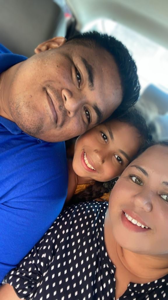 Koji Taisacan with wife and child