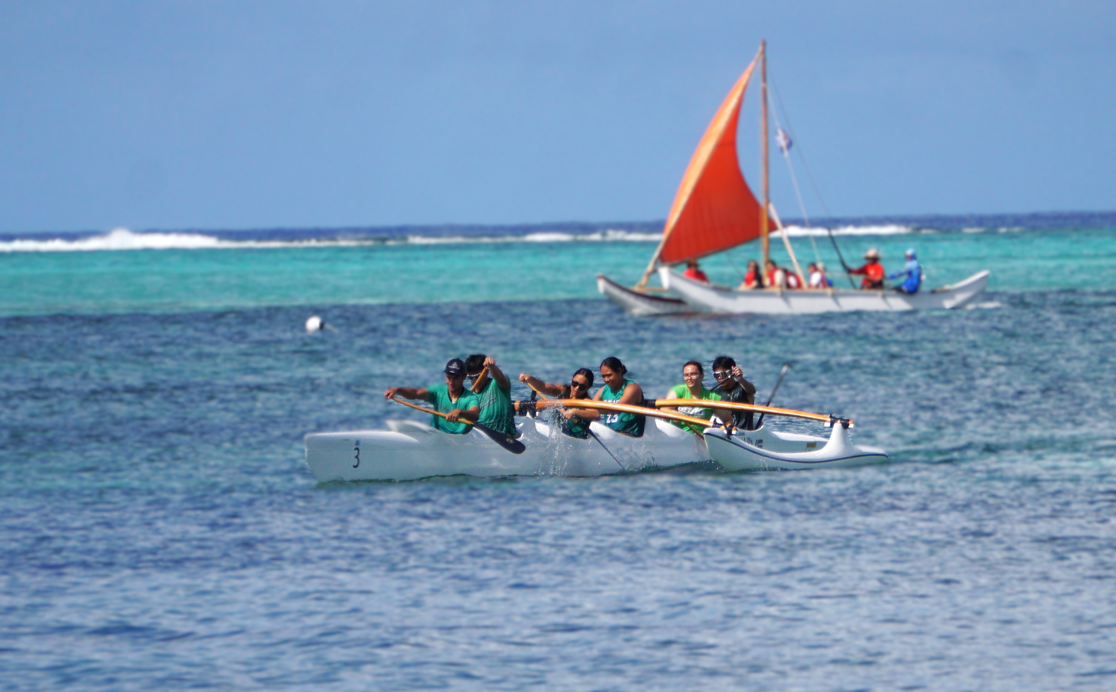 Saipan Southern High School pushes through the final leg of a 1000m event of the PSS-NMNPSF Interscholastic Outrigger Race Series SY24-25 at Kilili Beach.