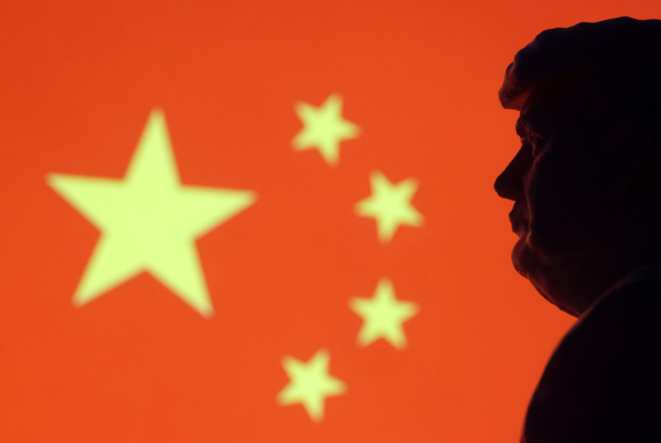 A 3D-printed miniature model of President-elect Donald Trump and the Chinese flag are seen in this illustration taken on Jan, 15, 2025.REUTERS