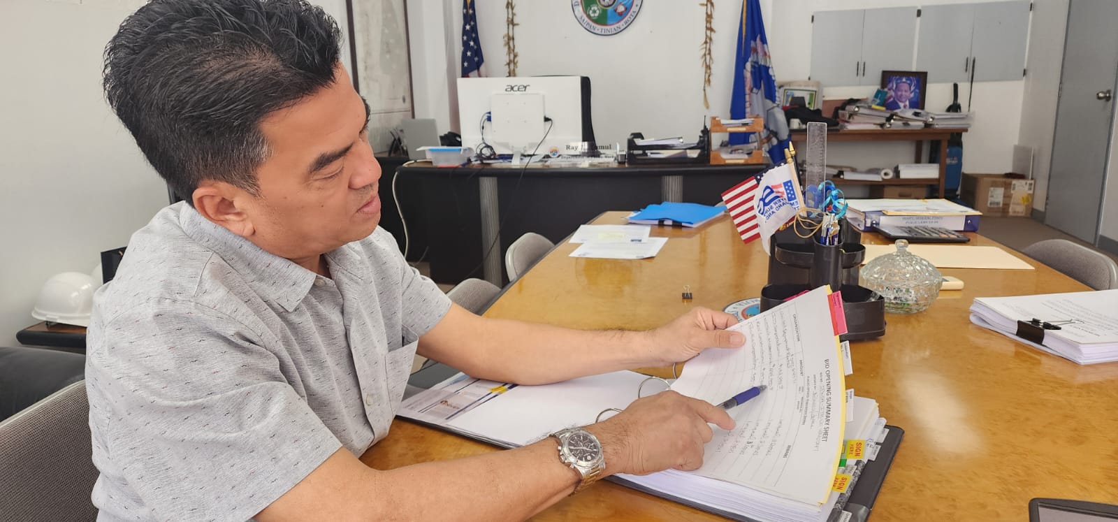 Department of Public Works Secretary Ray N. Yumul talks about the Achugao stormwater drainage project on Friday at his office in San Jose.