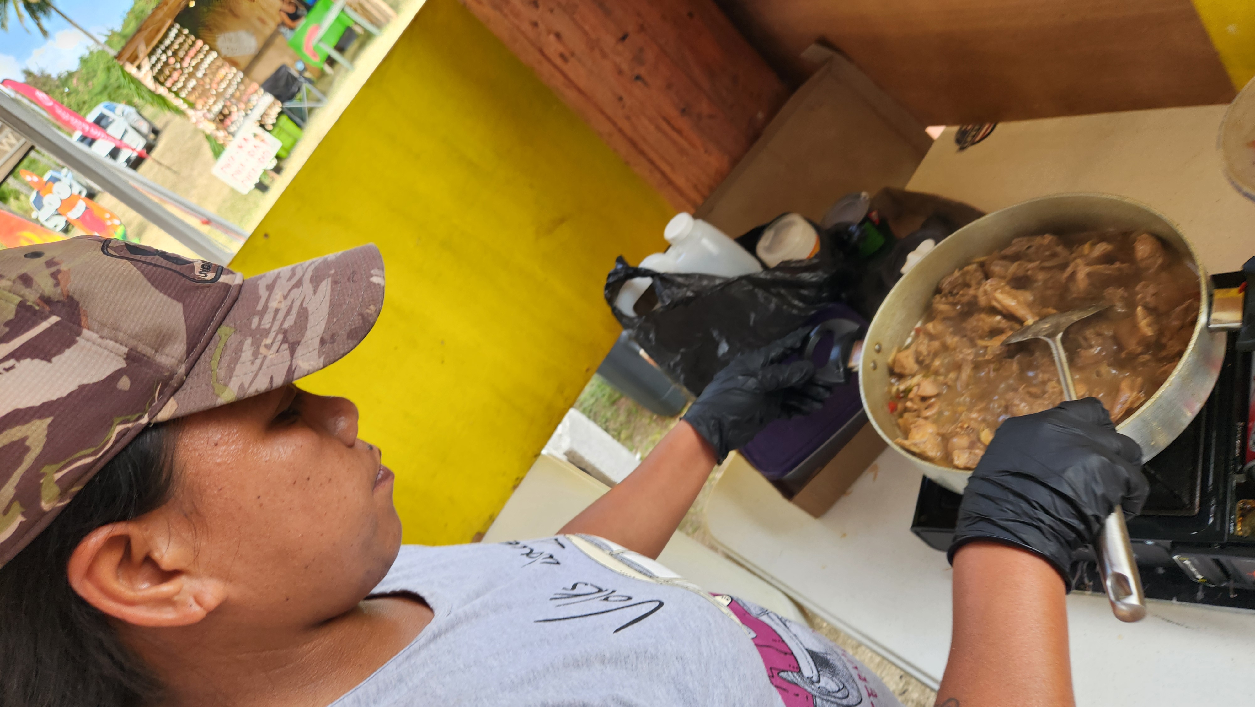 Rene Dungong prepares her eventual 1st place entry to the Katdun Pika Cooking Contest during the 21st Annual Tinian Hot Pepper Festival held on Feb. 14-15, 2025, in San Jose, Tinian, in The Marianas.
