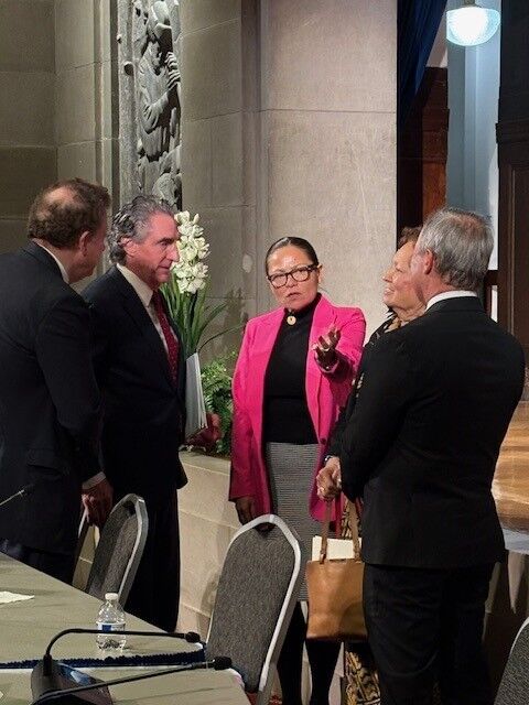 U.S. Congresswoman Kim King-Hinds gestures while speaking with Secretary of the Interior Doug Burgum, Senior Advisor to the Interior Secretary Scott Cameron, U.S. Congresswoman Aumua Amata of American Samoa and U.S. Congressman James Moylan of Guam.