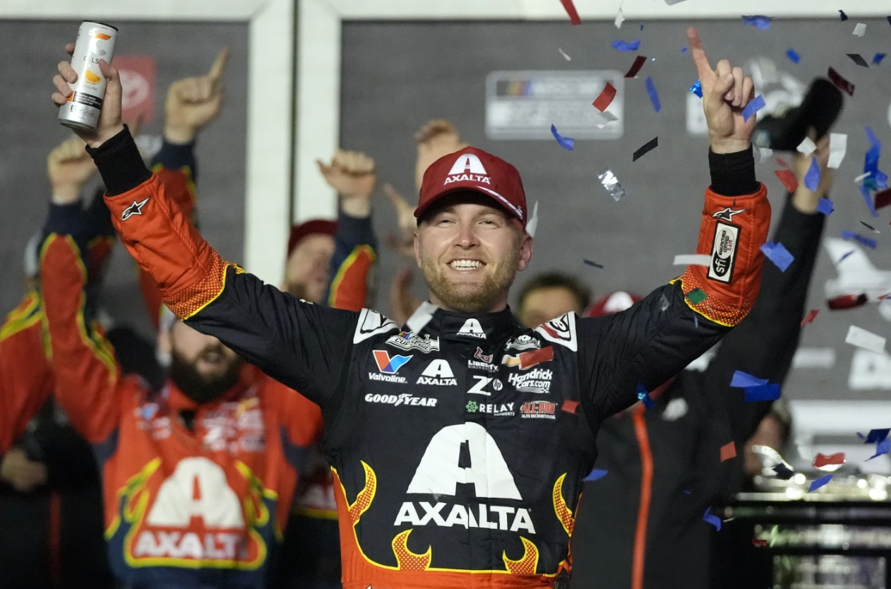 William Byron celebrates in Victory Lane after winning the NASCAR Daytona 500 auto race at Daytona International Speedway, Sunday, Feb. 16, 2025 in Daytona Beach, Fla.