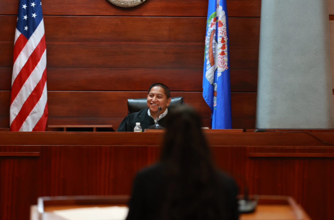 Attorney Victorino Torres presides over a Preliminary Round trial between Kagman High School and Saipan Southern High School