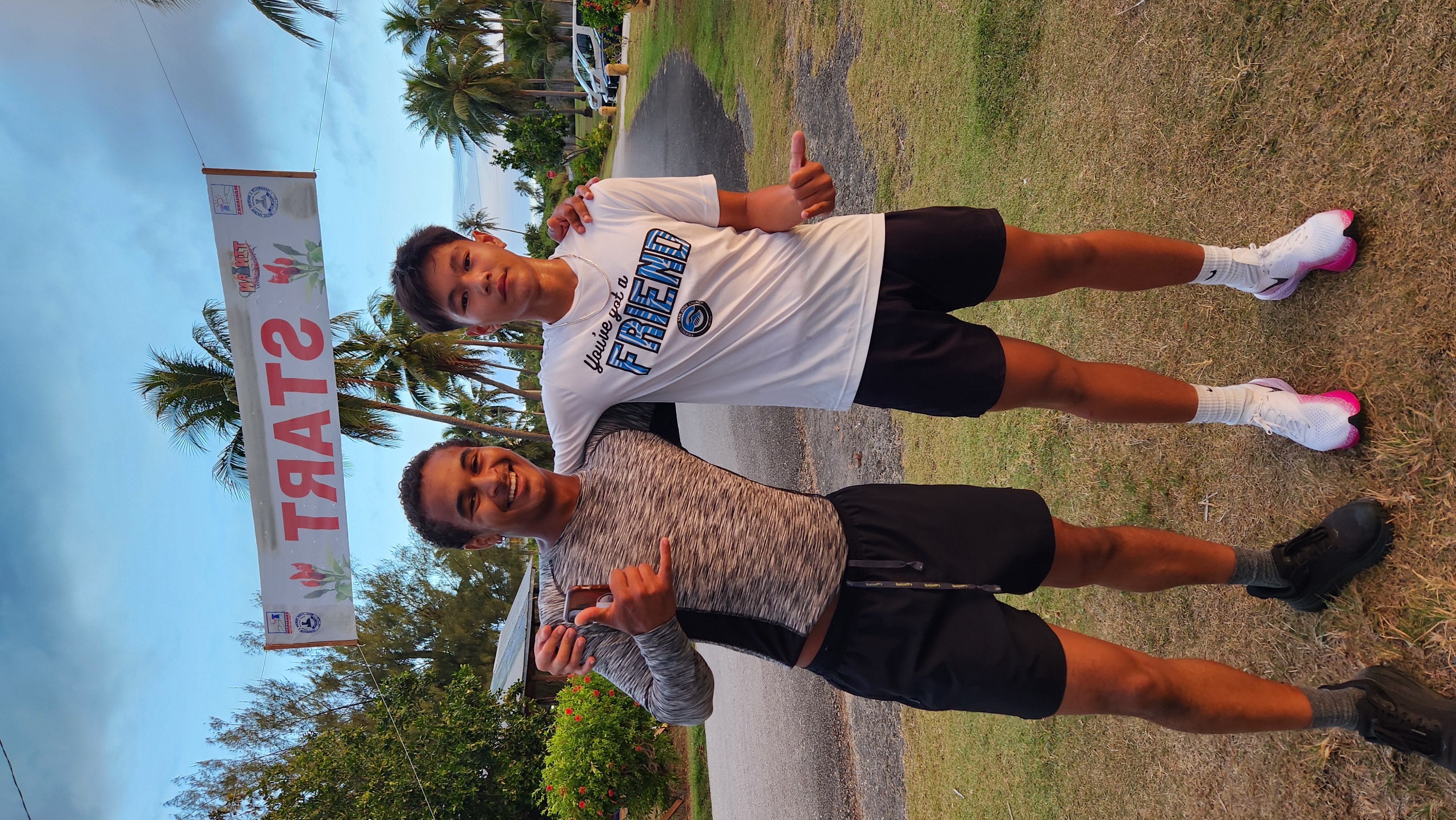 Pika Run 5K top finishers Juan Salgado, left, and Edmar Tirona celebrate their winning finish at the 21st Annual Tinian Hot Pepper Festival held on Feb. 14-15, 2025, in San Jose, Tinian, in The Marianas.