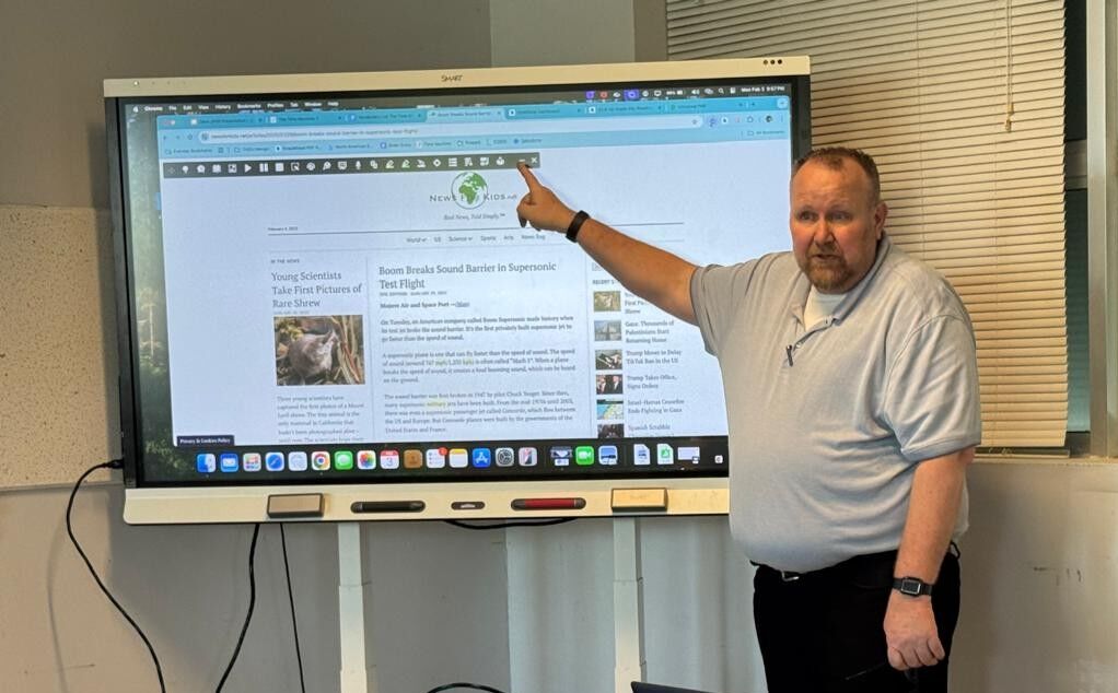 Dave Butler, the national account director for Everway, makes a presentation at Sinapalo Elementary School on Rota.