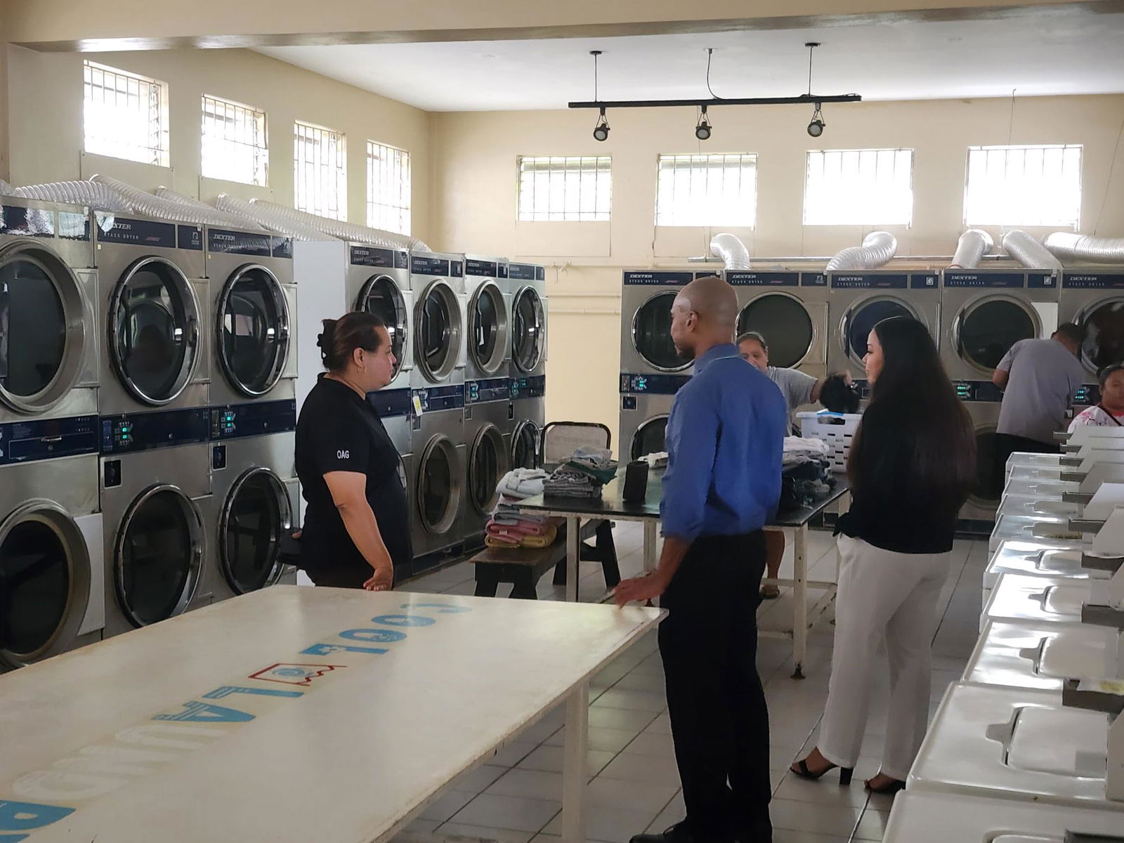 Chief Prosecutor Chester Hinds with other criminal division staffers at Cool Laundry on Wednesday afternoon.