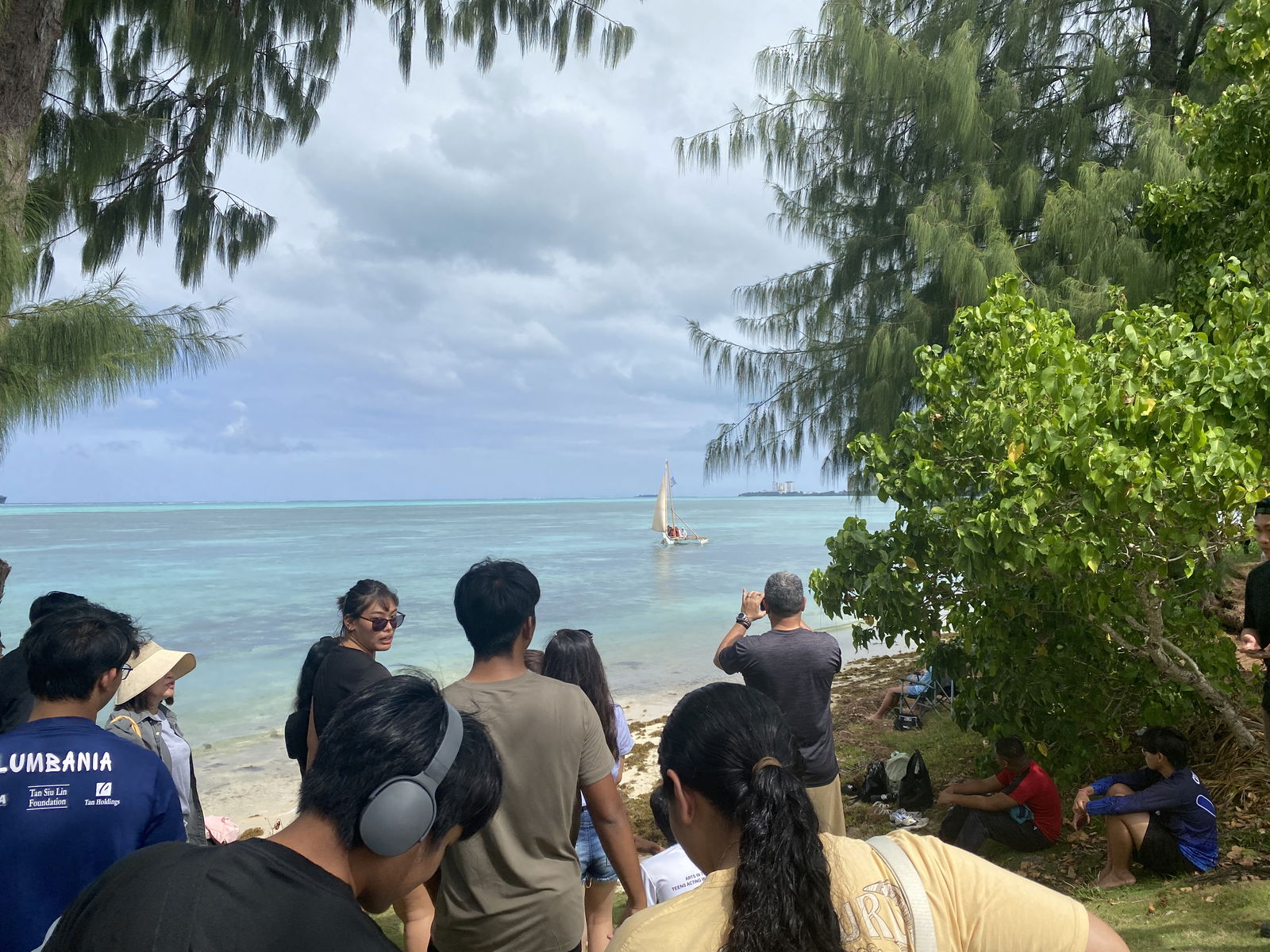 The students took the traditional canoe Anåguan, background, from Crowne Plaza to Susupe.
