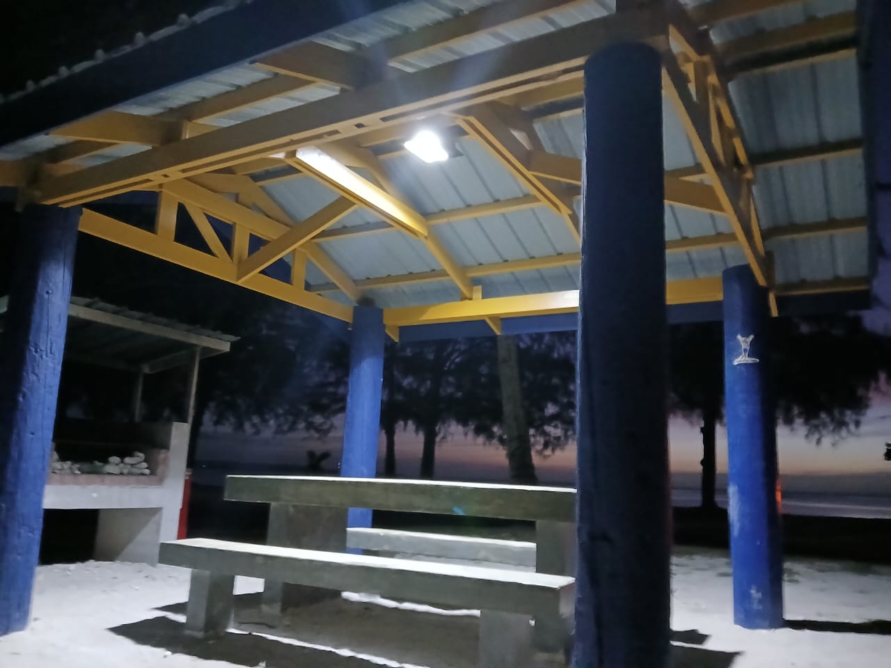 A picnic shelter with solar lights at Sugar Dock.