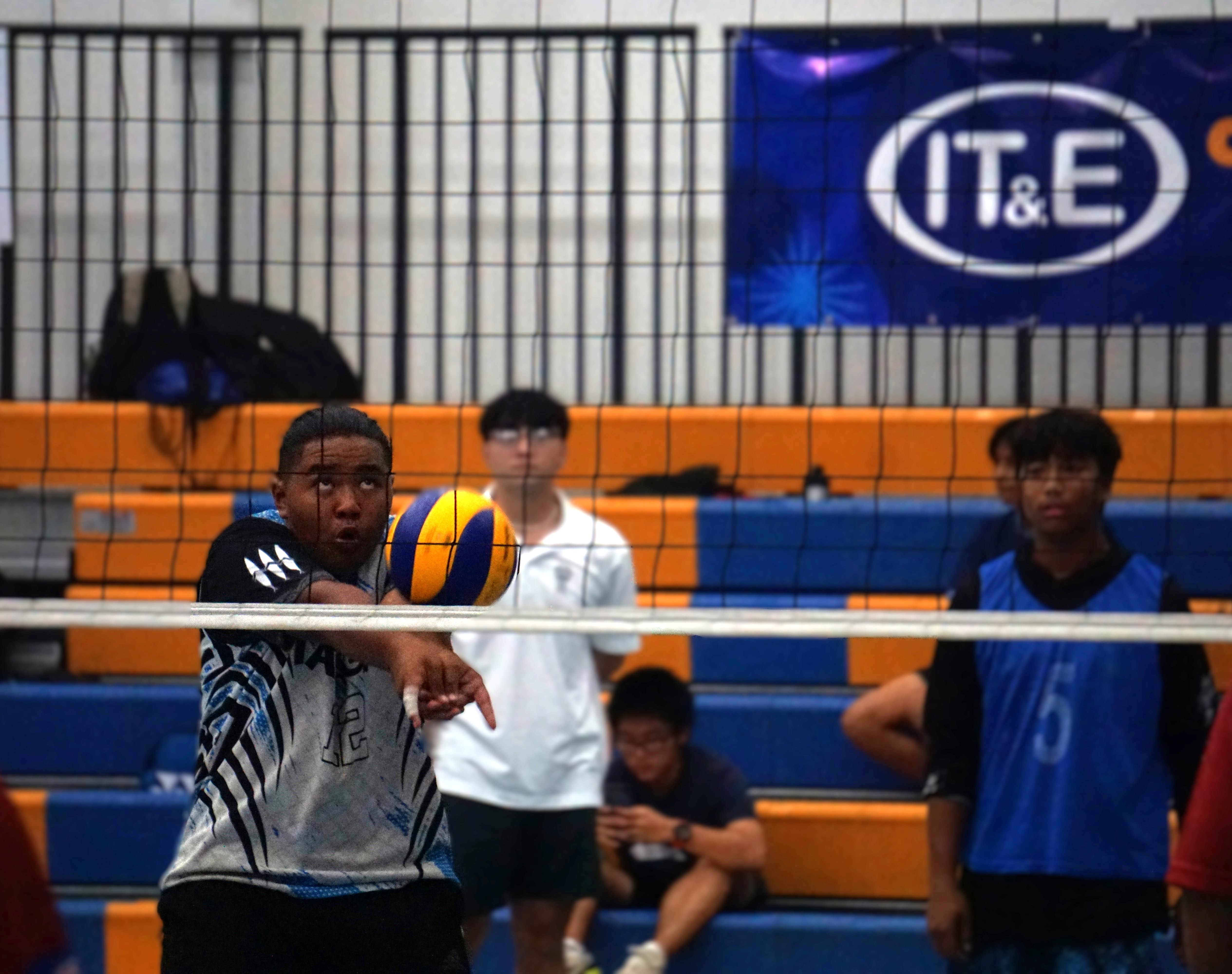 Tanapag Middle School's Kinluk Sharry extends for the bump return during a boys middle school division game of the PSS-NMIVA Interscholastic Volleyball League SY24-25 at the MHS gym.