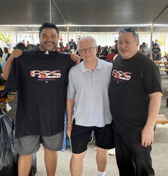 Educator James Feger presented BOE Chairman Aschumar Kodep Ogumoro-Uludong and BOE member Andrew L. Orsini with Roccball shirts. Feger created the sport of Roccball in 1979.