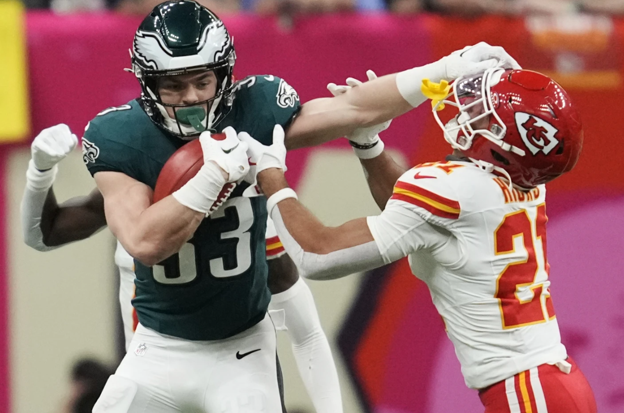 Philadelphia Eagles linebacker Zack Baun stiff arms Kansas City Chiefs defensive back Jaden Hicks during the first half of the NFL Super Bowl 59 game on Sunday, Feb. 9, 2025 in New Orleans.