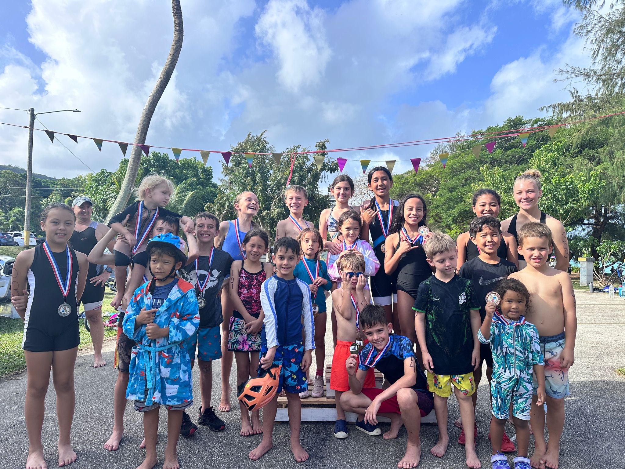 The young participants of the triathlon event pose for a group photo.Contributed photos