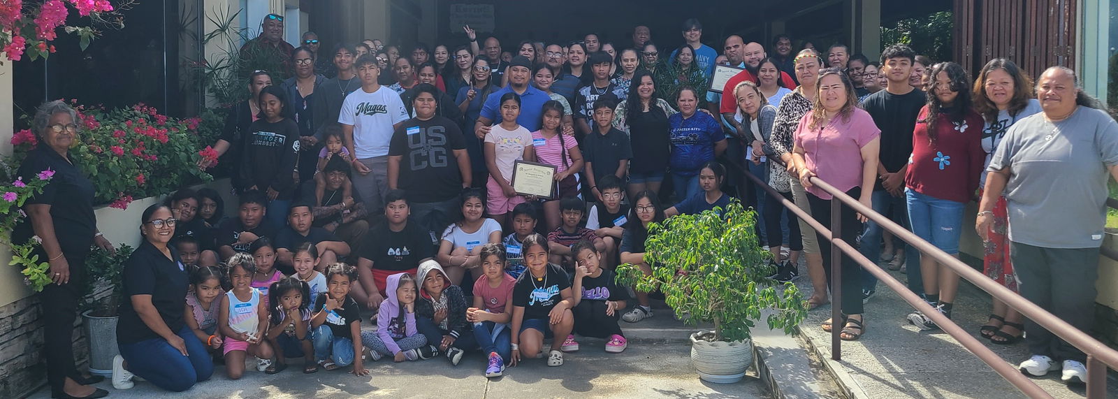 Division of Youth Services Administrator Vivian Sablan joins parent leaders for a group photo during the 2025 Parent Leadership Summit at Aqua Resort Club on Saturday.