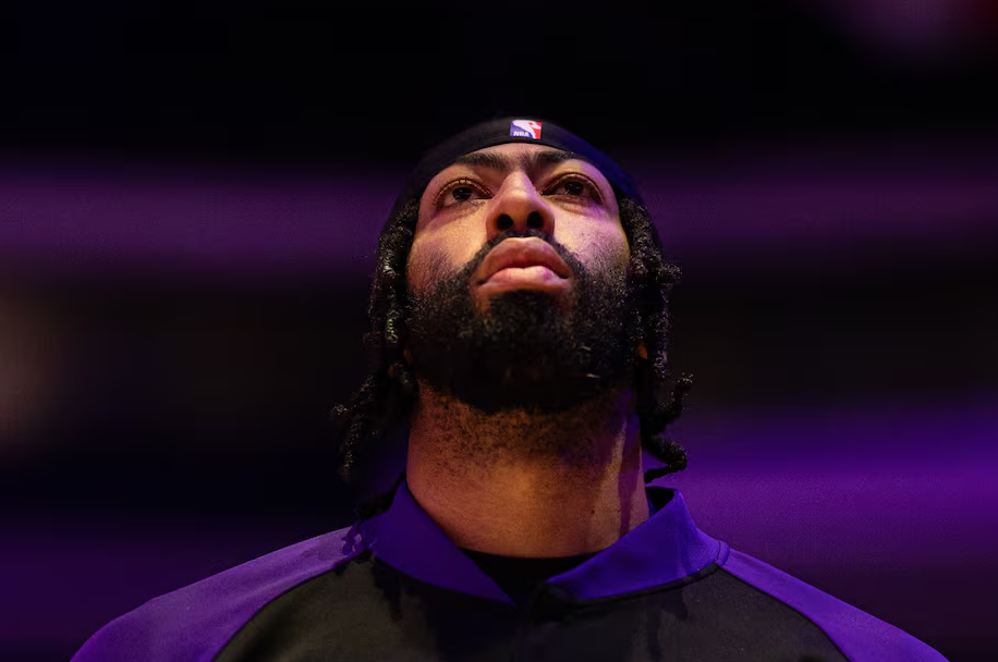 Los Angeles Lakers forward Anthony Davis stands for the anthem before action against the Philadelphia 76ers at Wells Fargo Center in Philadelphia, Pennsylvania, Jan. 28, 2025.
