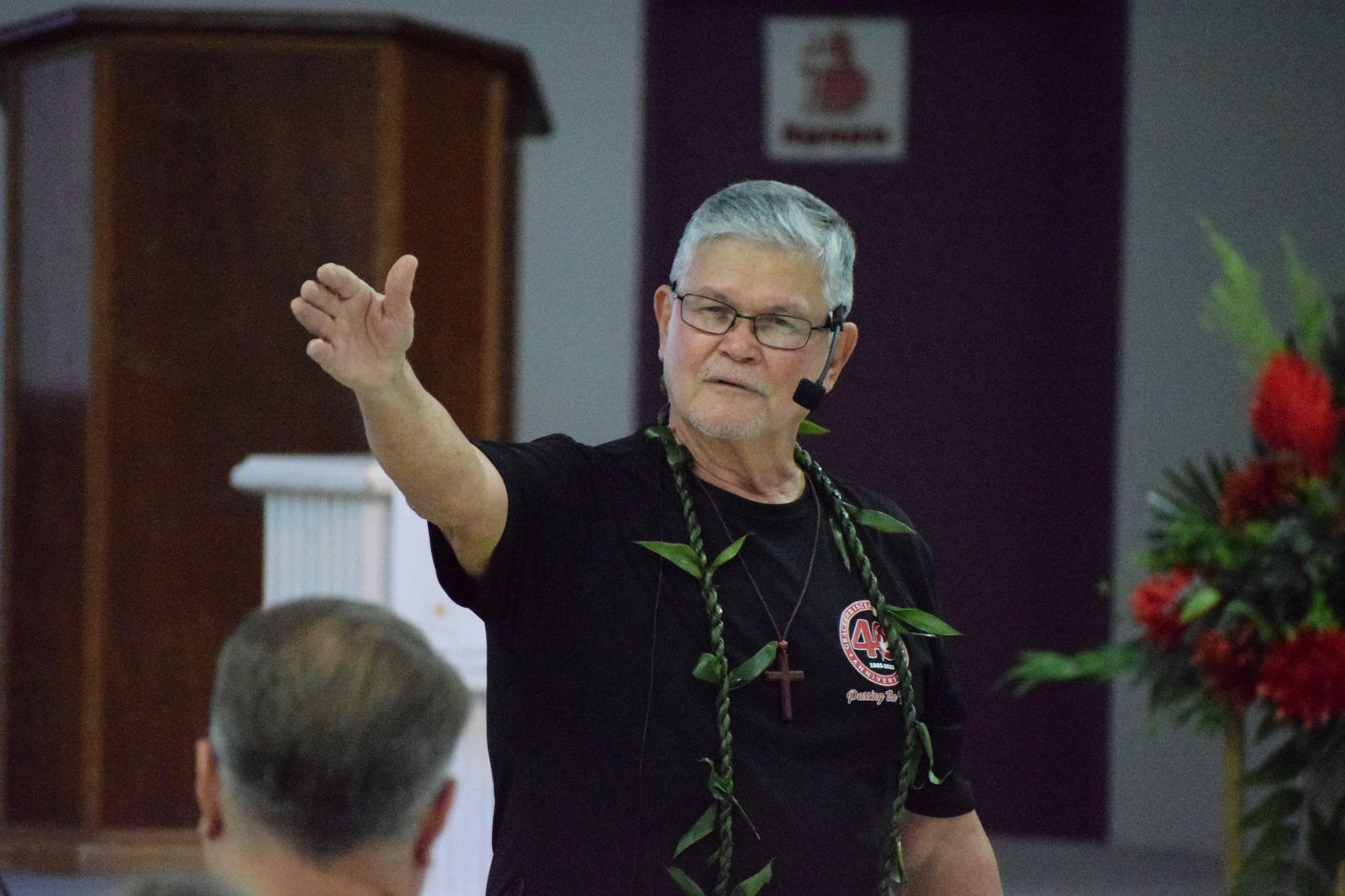 Reverend Raymond Kinsella gestures as he delivers his inspirational message to the congregation of Grace Christian Ministries on Navy Hill on Sunday, Feb. 16, 2025.