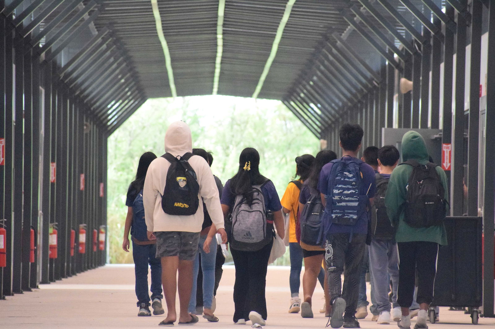 Hopwood Middle School students enter their brand new modular school building on Tuesday.Photo by Emmanuel T. Erediano