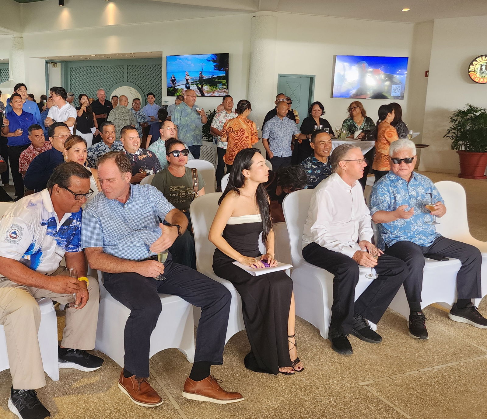 Asia Pacific Development, Marriot International Regional Vice President Peter Gassner talks  with Saipan Mayor Ramon “RB” Camacho. Also in the photo are MB Capital LLC President David Hood, Gov. Arnold I. Palacios, other officials and guests.