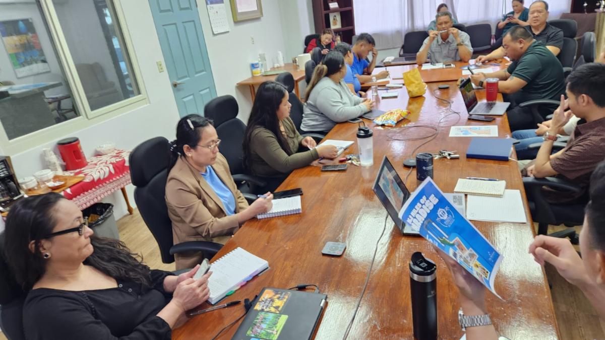 Marianas Visitors Authority Community Projects Specialist Ed Diaz, sixth right, convenes a meeting with staff at the MVA office on March 3, 2025, in preparation for Skechers Saipan Marathon 2025 set for March 8.