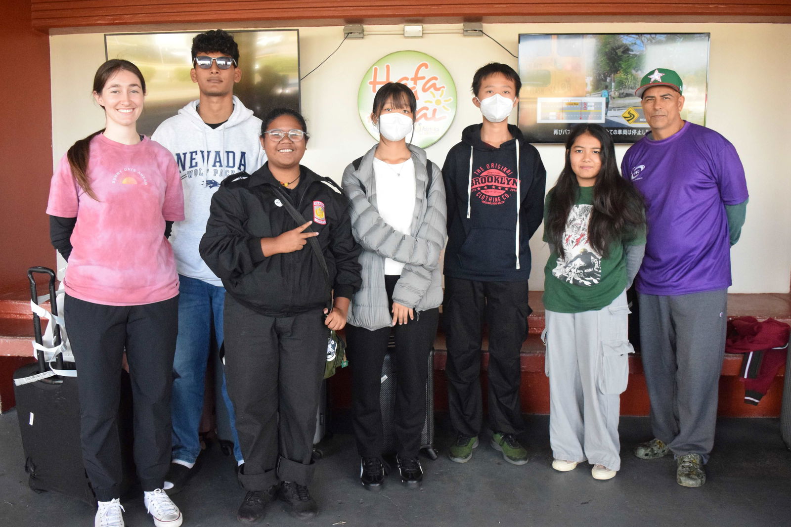 From left, Marianas High School counselor Gabrielle Race, Biba MHS team members Minul Hoque, Caitlin Ignacio, Jess Gong, Jevon Gong, team captain Sora Baidya, and MHS JROTC instructor Ret. SFC Albert Lujan pose for photo upon their arrival on Feb. 25, 2025 at the Francisco C. Ada/Saipan International Airport.Photo by Emmanuel T. Erediano