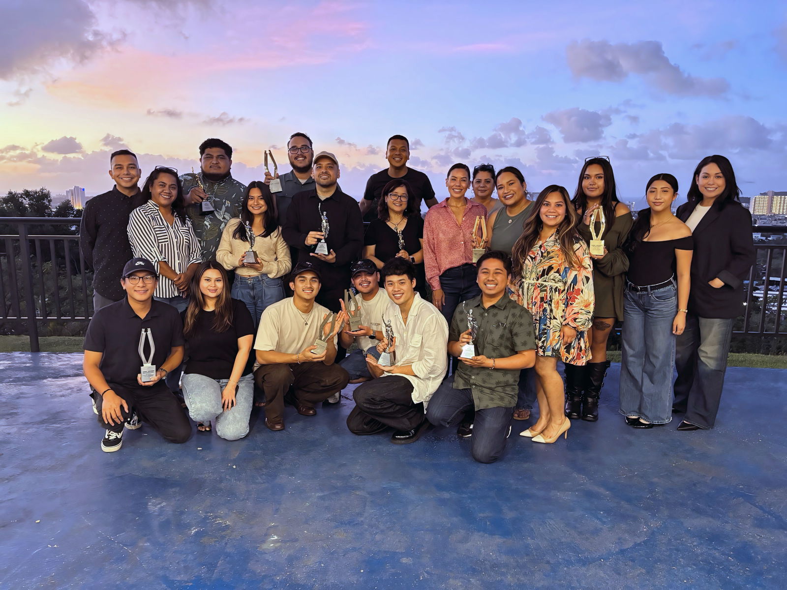 Bank of Guam celebrates with its creative partners commemorating eight MarCom award wins. Pictured, bottom row, from left: Nico Serneo, Cinematographer and Co- Managing Member, Mighty Island; Amber Dydasco, Customer Experience Manager, Bank of Guam; Lorenzo Hosea Jorolan, Content Creator, Valuable Media; Ron Lansang, Content Creator, Valuable Media; Jacy Bravo, President, Valuable Media; and Ryan Eric Ramolete, Senior Account Executive, Big Fish Creative, Inc. and back row, standing from left, Ken Quintanilla, Community Relations Manager, Bank of Guam; Sharlene Guevara, Operations Manager, Big Fish Creative, Inc.; Travis Meno, Brand & Community Relations Officer, Bank of Guam; Danielle Arriola, Account Manager, Big Fish Creative Inc.; Kyle Perron, Creative Director and Co-Managing Member, Mighty Island; Gregory San Nicolas, Senior Art Director, Big Fish Creative Inc.; Danny Daniel, Vice President, Director of Brand and Community Relations, Bank of Guam; Marisol Delin, Creative Director, Big Fish Creative, Inc.; Lesley Leon Guerrero, Senior Vice President, Chief Experience Officer, Bank of Guam; Andrea Pellacani, Senior Account Executive, Big Fish Creative, Inc.; Mia O’Mallan, Content Manager, Bank of Guam; Audrey Diaz Cruz, Creative Manager, Bank of Guam; Oshay Sablan, Graphic Designer, Big Fish Creative, Inc.; Asia Marie Villareal, Intern, Big Fish Creative Inc.; and Deanne Torre, Managing Partner, Big Fish Creative Inc.Bank of Guam photos