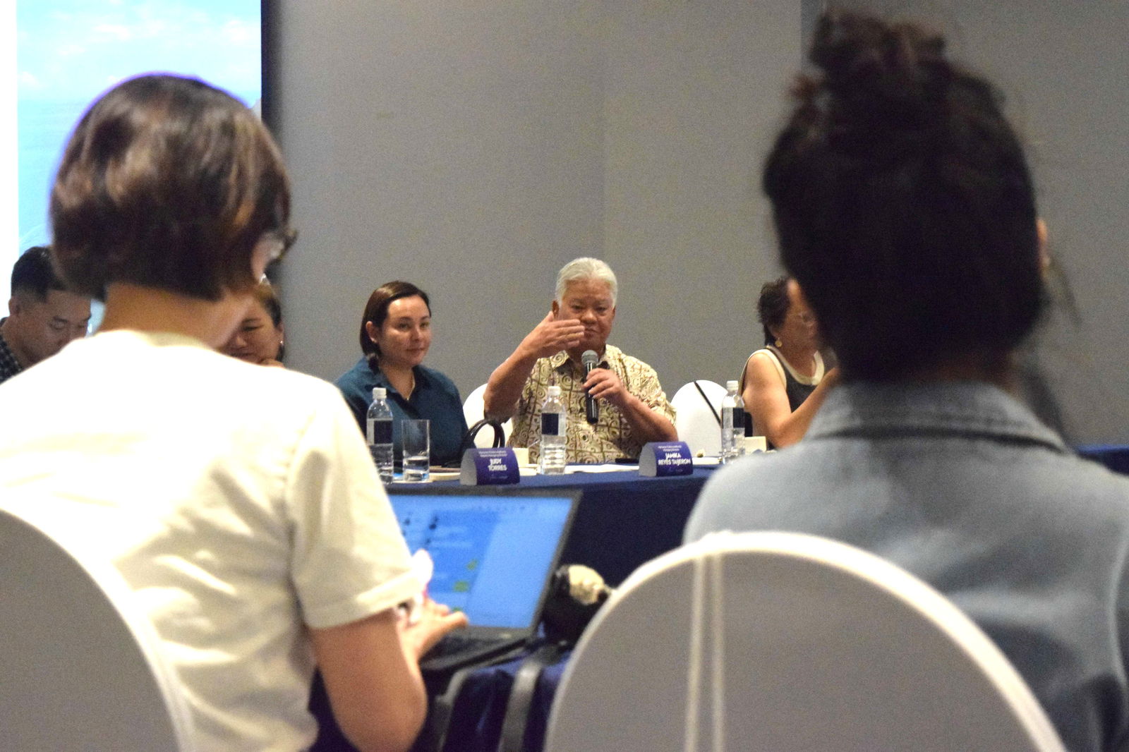 Gov. Arnold I. Palacios gestures as he answers a question from a visiting Korean journalist during a press conference at the Kensington Hotel's Queens Hall on Wednesday.