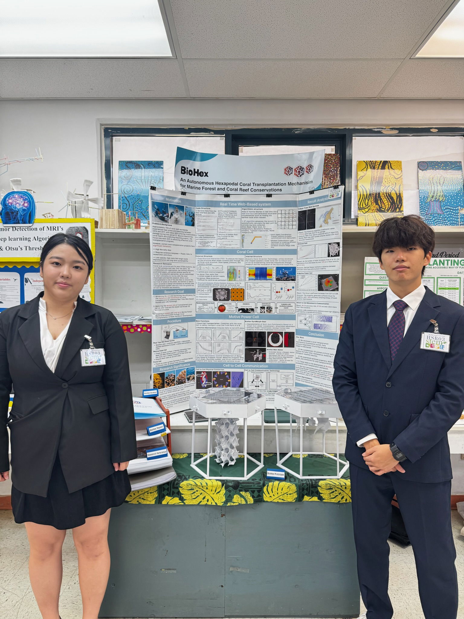 Ja Young Kim, left, and Ji Ho Kong topped the high school division of the STEM Fair.