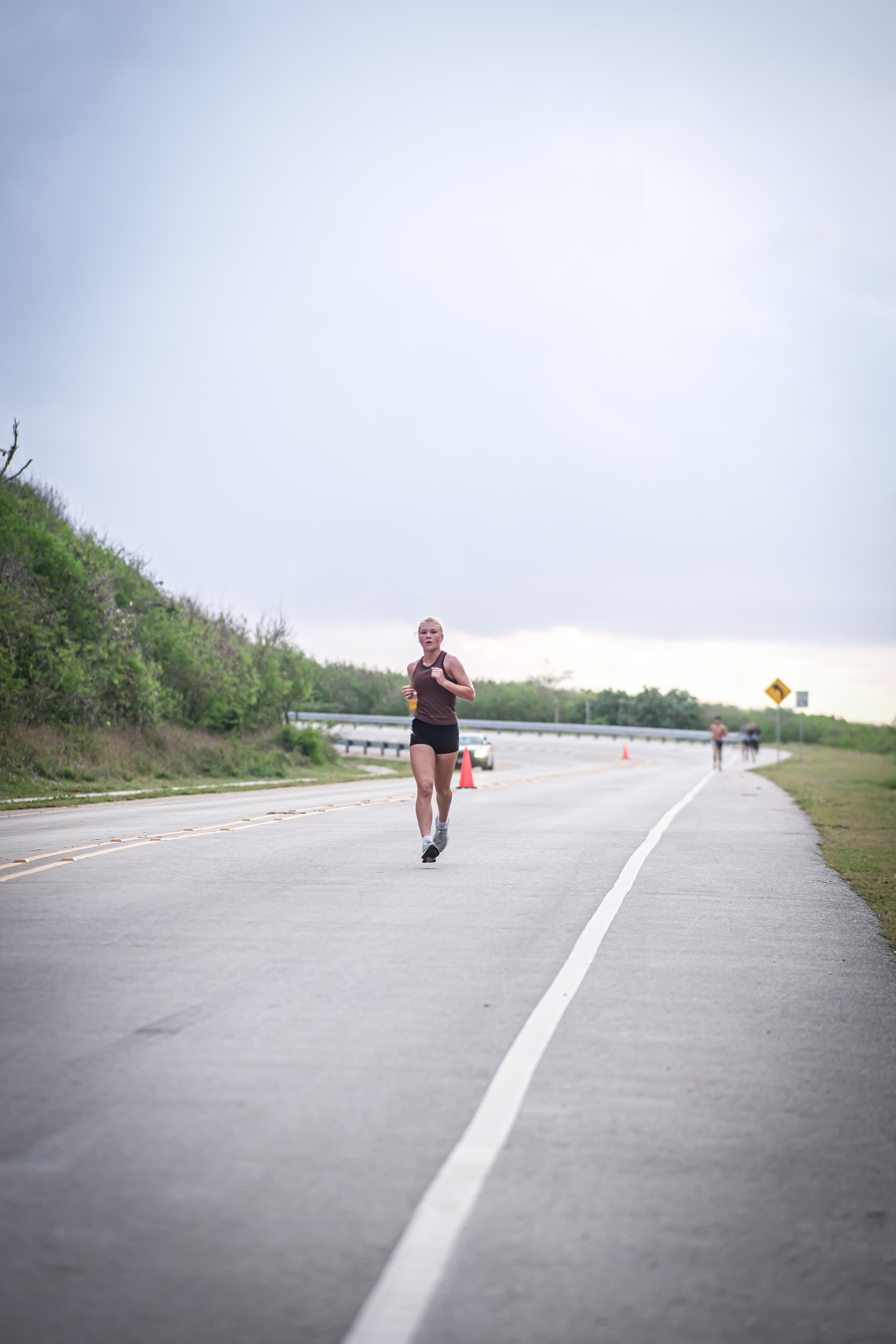 Addalee Taflinger completes a turn during Run Saipan’s Mangrove 5K race Saturday morning on Route 36.Contributed photo