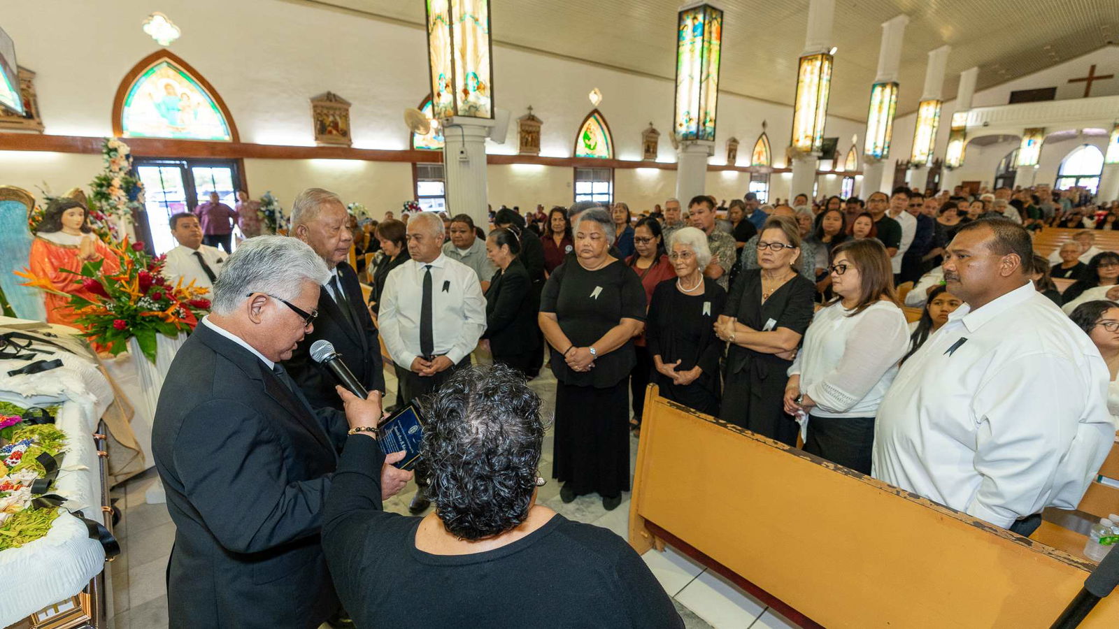 Gov. Arnold I. Palacios leads CNMI officials in paying tribute to former Speaker Oscar Manglona Babauta during the funeral service at Mount Carmel Cathedral on Wednesday morning.Contributed photo