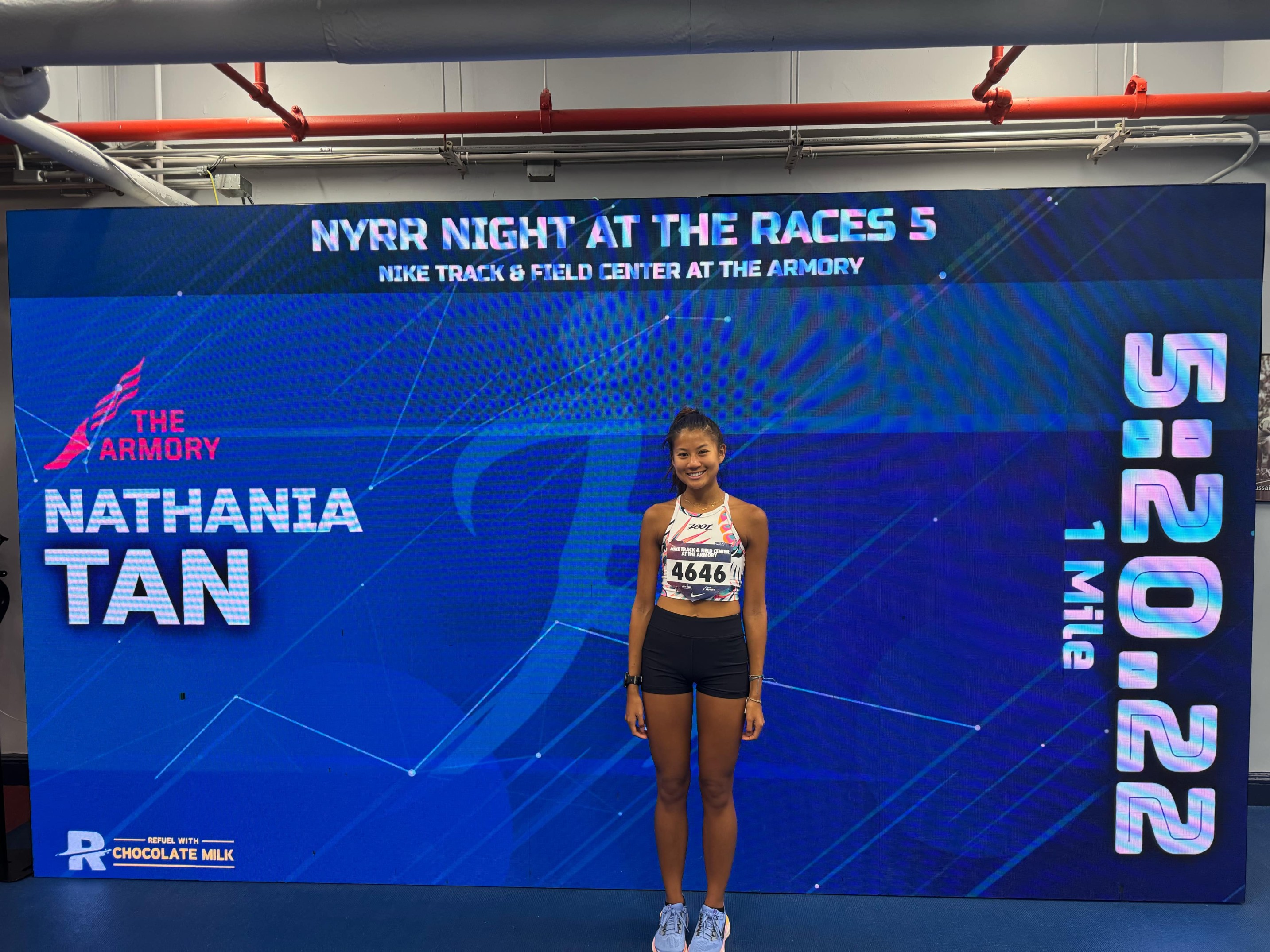 Tania Tan poses for a photo after recording a new personal best and NMI record of 5:20.22 during the NYRR Night at the Races 5 at the Armory Track in New York on Thursday.