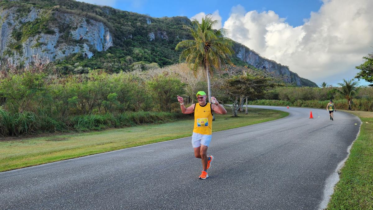 Peter Friis of Germany approaches the turnaround point for the full marathon of Skechers Saipan Marathon 2025 on March 8, 2025.