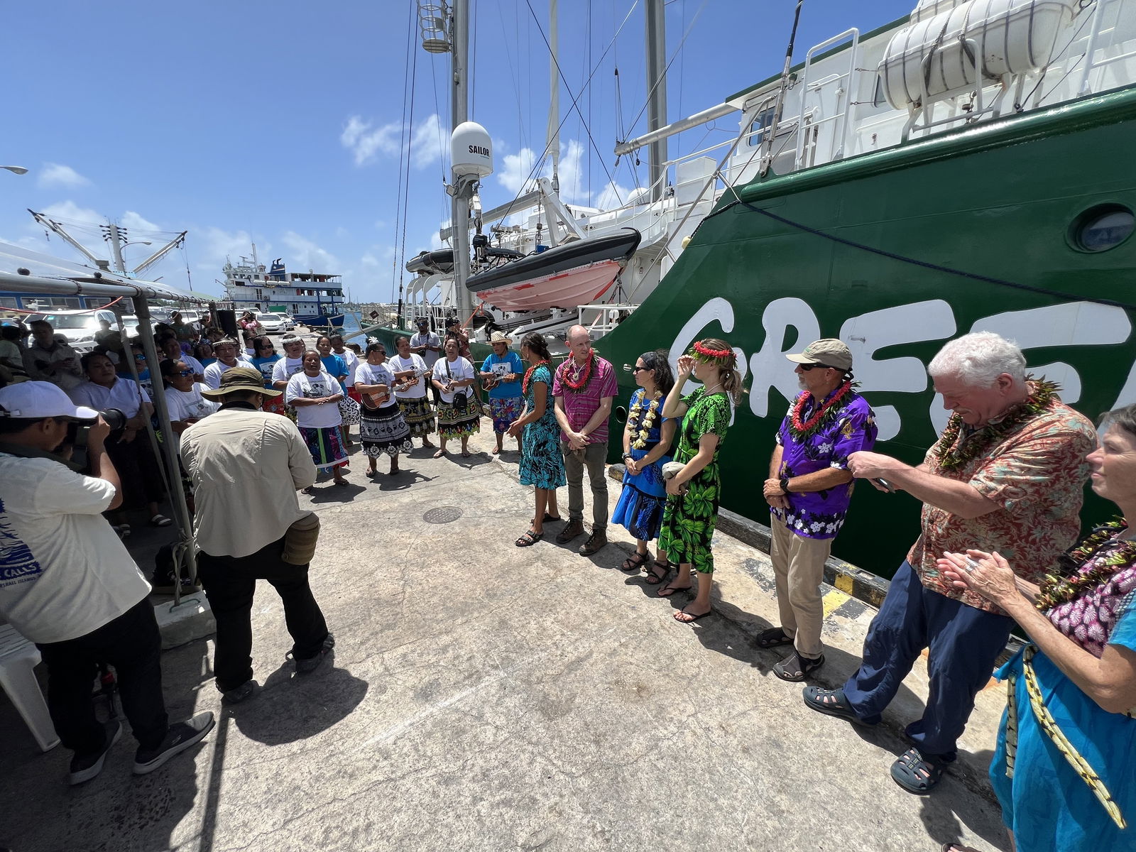 Women from the nuclear test-affected Rongelap Atoll greeted the Rainbow Warrior and its crew with songs and dances as part of celebrating the 40th anniversary of the evacuation of Rongelap Atoll in 1985 by the Rainbow Warrior.Photo by Giff Johnson