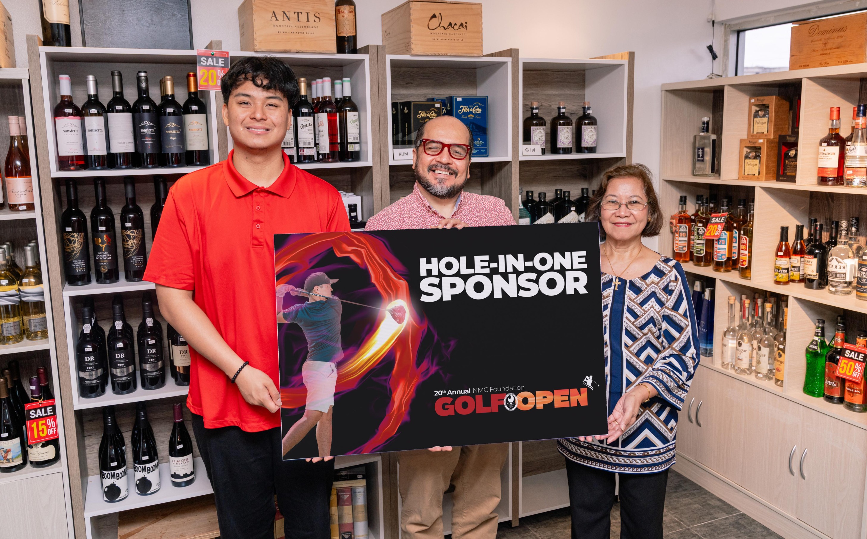 As part of its commitment to supporting education in the CNMI, Top Shelf Wines and Spirits is offering a $10,000 shopping spree at its store as a hole-in-one prize at the Northern Marianas College Foundation’s upcoming Golf Open. From left: Associated Students of NMC Treasurer Richard Baleares, NMC President Galvin Deleon Guerrero, EdD, and Top Shelf Wines and Spirits employee Raquel Mostales.NMC photo