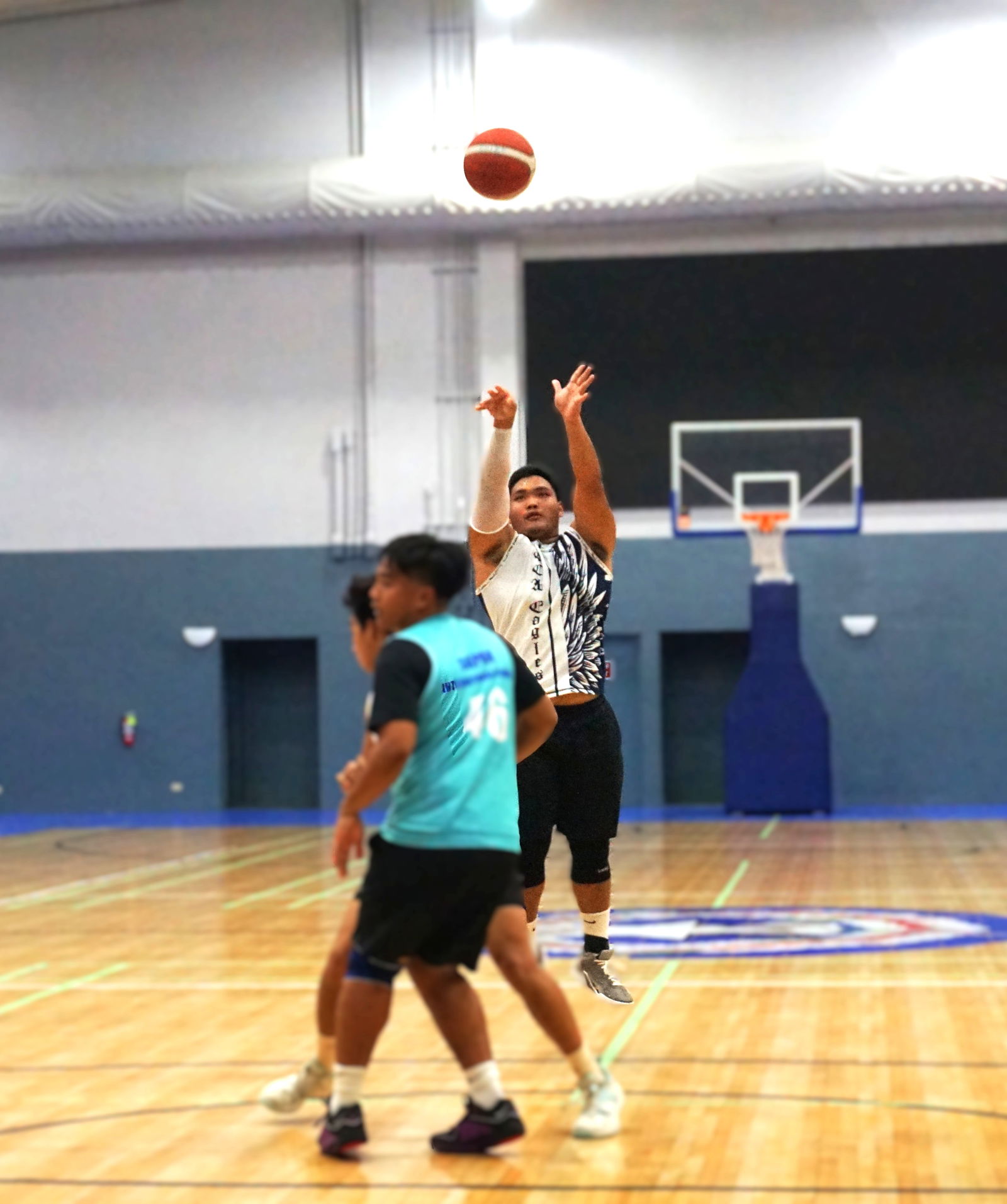 GCA’s Julian Taitano takes a three-point shot during a game against SIS in the boys high school division of the PSS-NMIBF Interscholastic Basketball League SY24-25 at the Ada gym on Wednesday