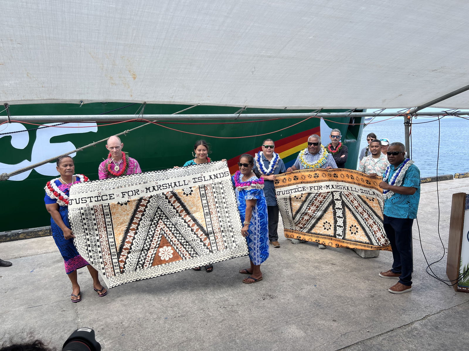 Crew of the Rainbow Warrior and other Greenpeace officials were welcomed to the Marshall Islands during a dockside ceremony in Majuro to mark the 40th anniversary of the evacuation of Rongelap Atoll.Photo by Giff Johnson
