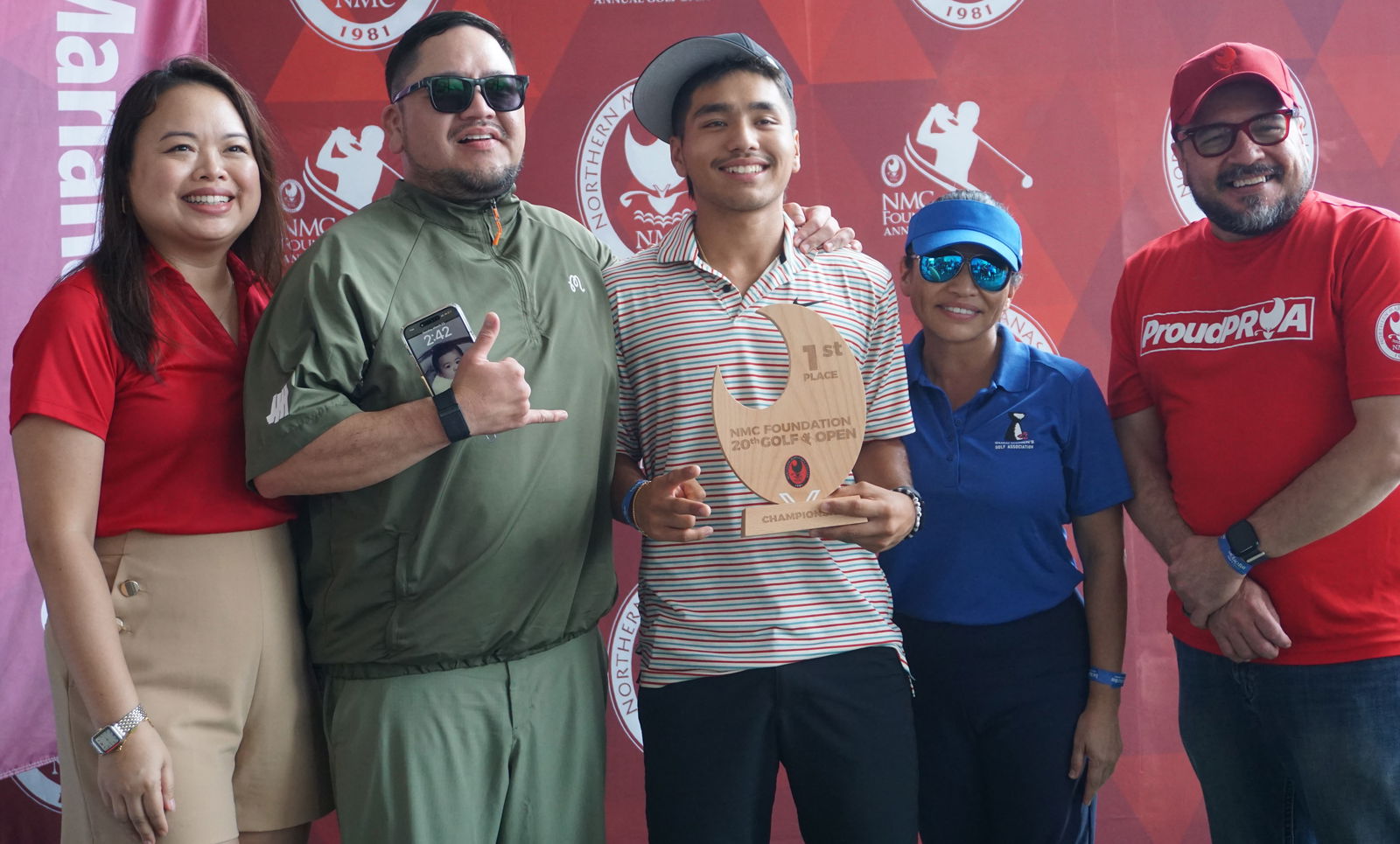 From left, Northern Marianas College Regent Michelle Lin Sablan, Tim Shiroma, his son Stussy Shiroma, Guam Hotel and Restaurant Association President Mary Rhodes, and NMC President Galvin Deleon Guerrero, EdD.Photo by James F. Sablan Jr.